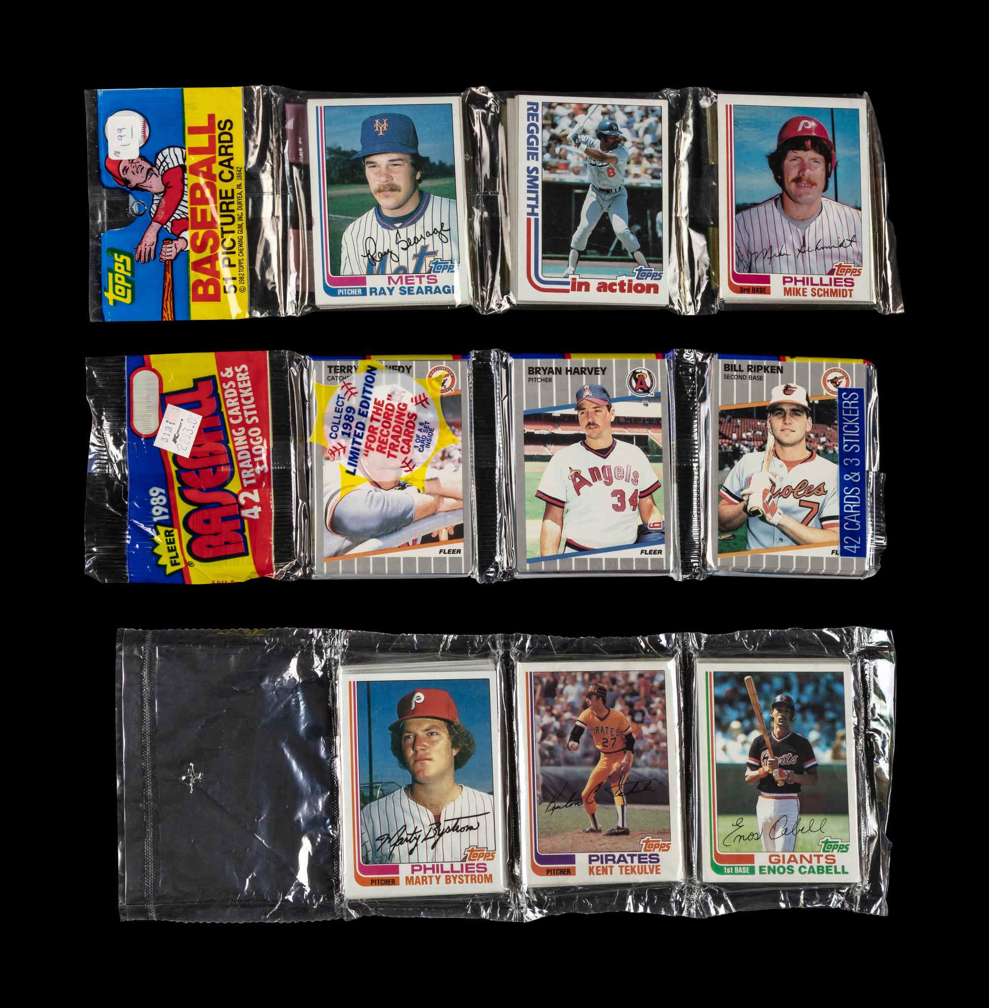 A Group of 1982 Topps Baseball Card Rack Packs with Cal Ripken Jr. Rookie Cards Visible and 1989 Fleer Rack Pack with Billy Ripken Error Visible