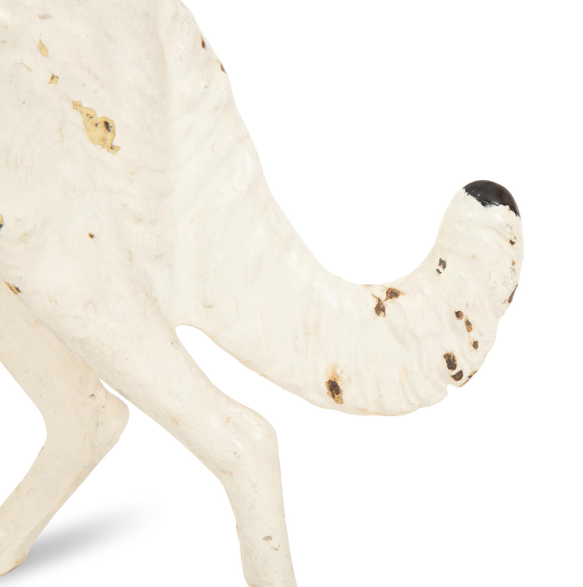 A Victorian Painted Iron Greyhound Doorstop and a Painted Wood Basket Doorstop