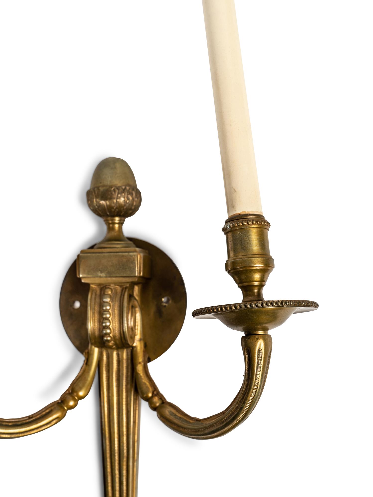 A Pair of Louis XVI Style Gilt Bronze Two-Light Wall Sconces — 20TH CENTURY