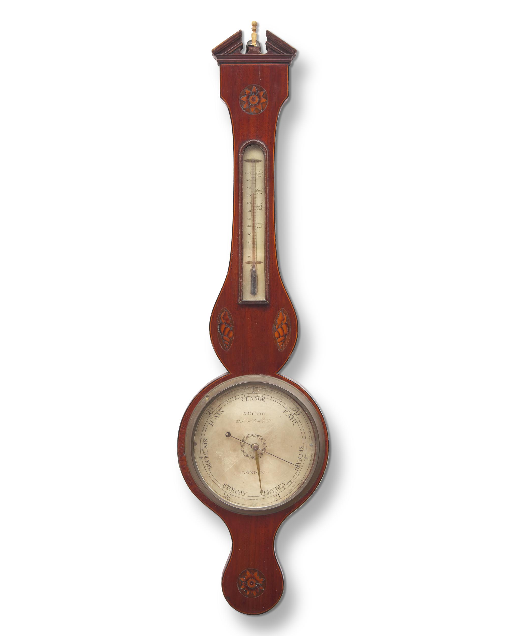 A Regency Inlaid Mahogany Wheel Barometer