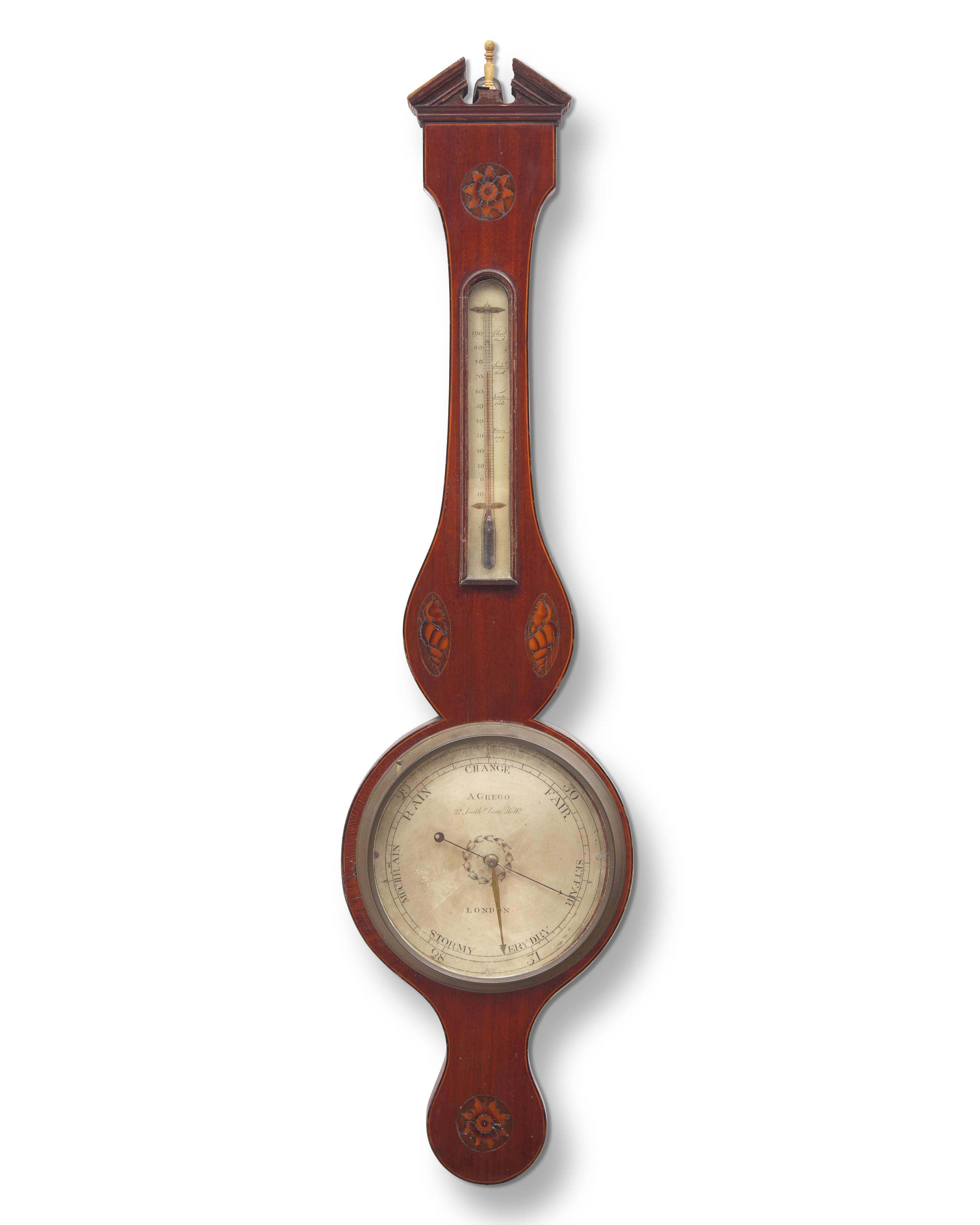 A Regency Inlaid Mahogany Wheel Barometer