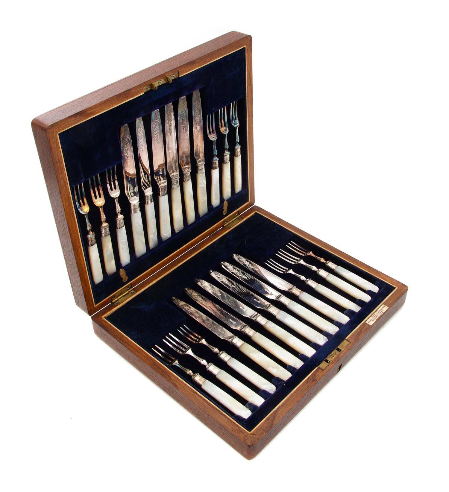 An English Cased Mother-of-Pearl Dessert Service