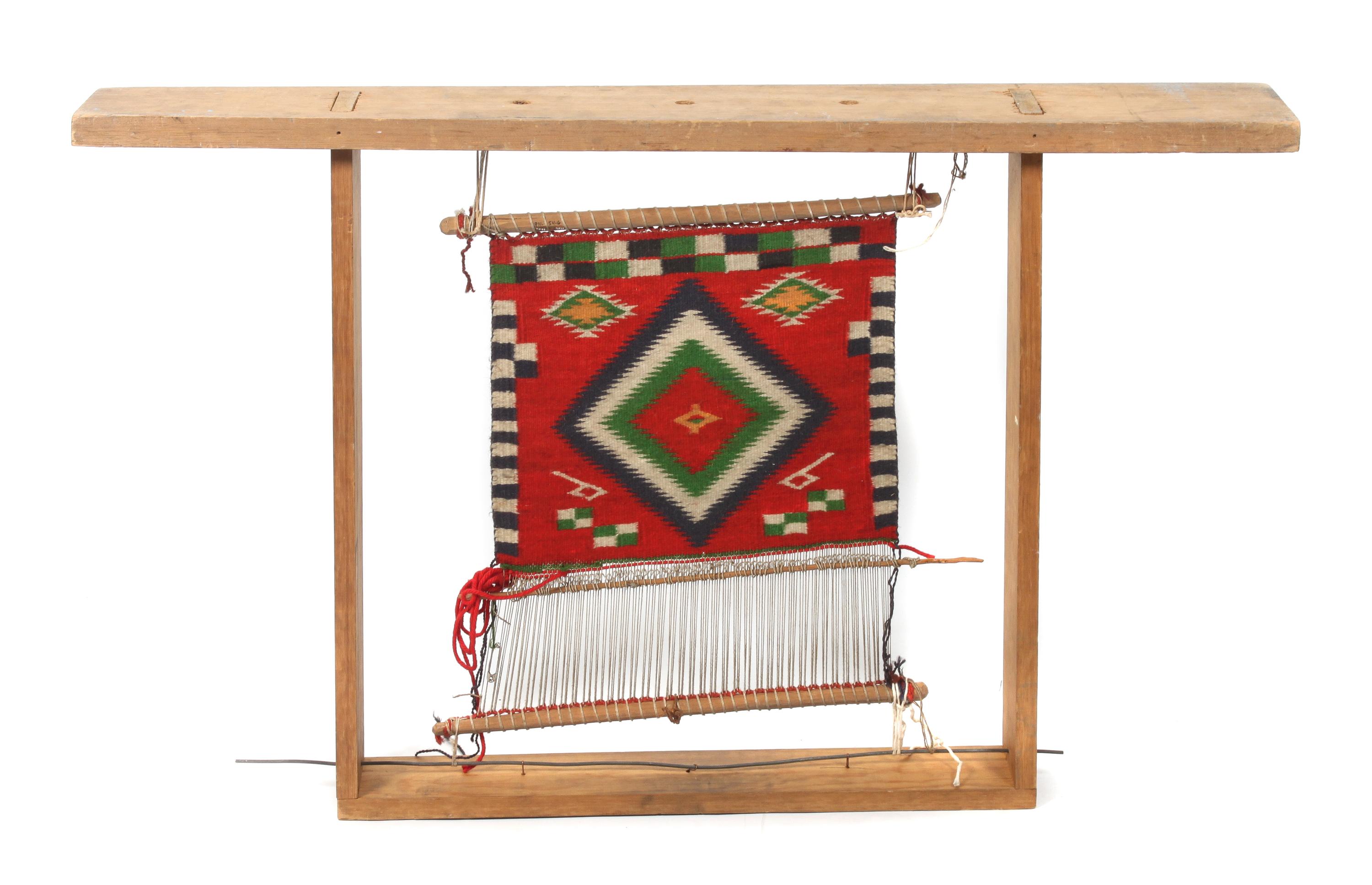 Three Navajo Weavings on Looms Height of largest loom 27 x width 43 3/4 inches.
