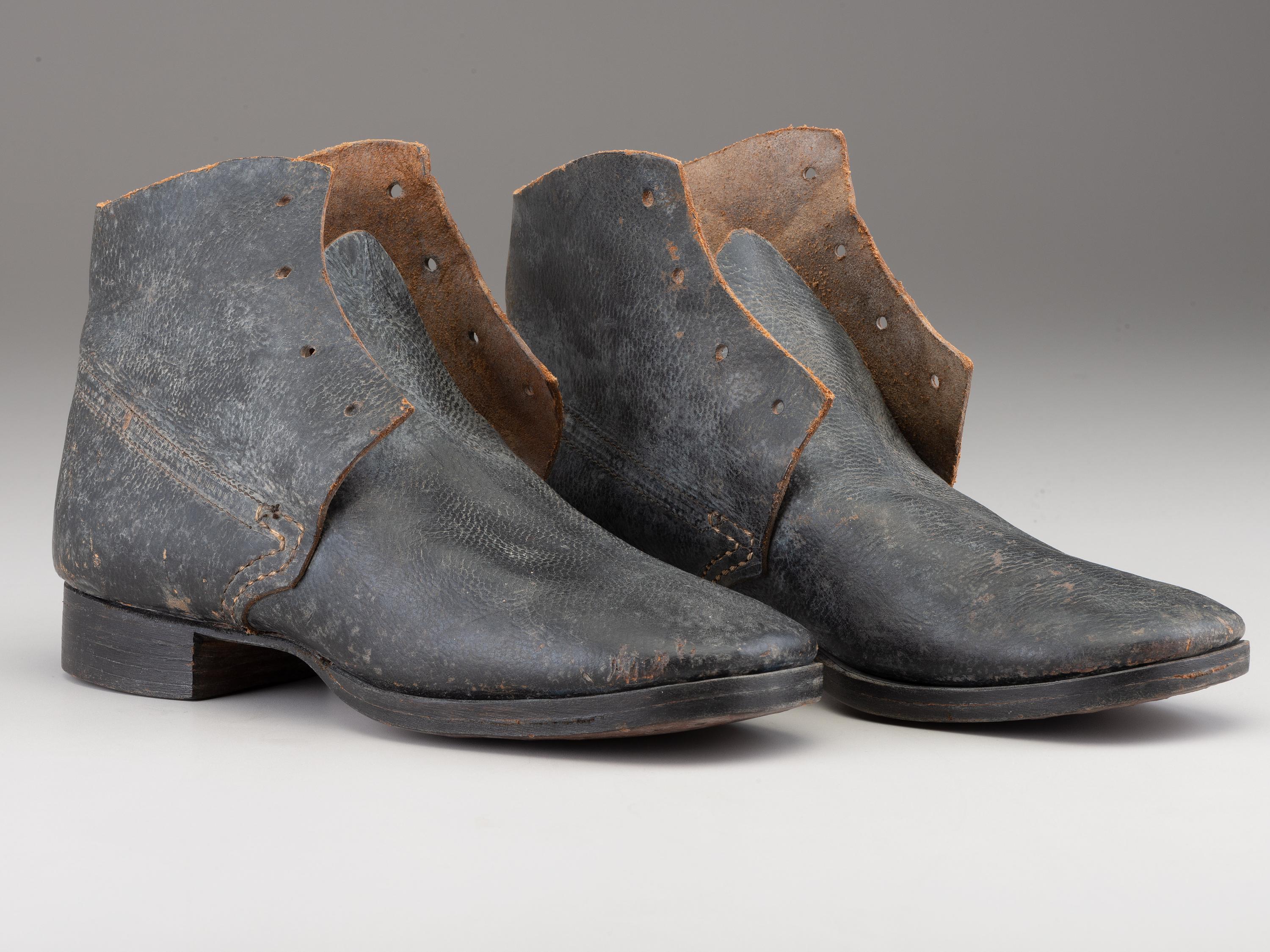 [CIVIL WAR]. A pair of military-issue brogans with a pair of Civil War-period socks.