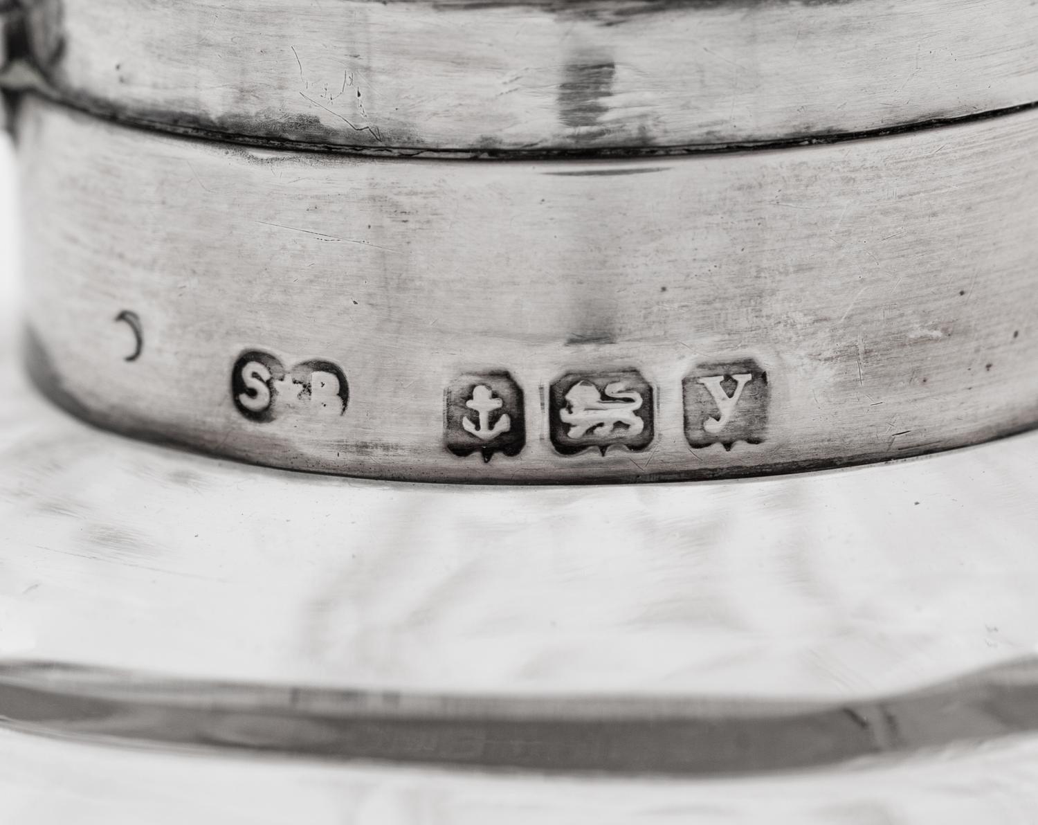 Four English Silver Mounted Cut Glass Bottles