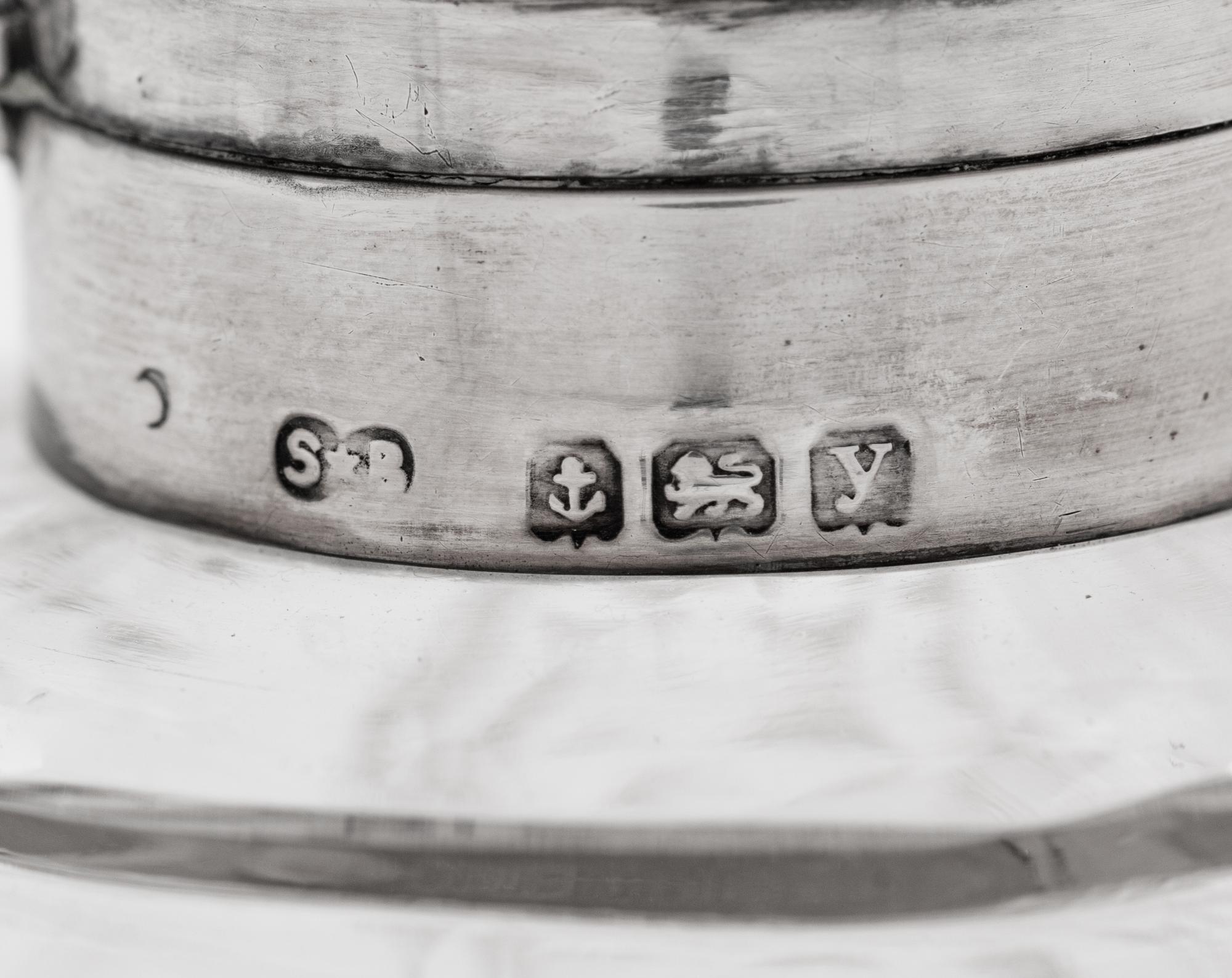 Four English Silver Mounted Cut Glass Bottles