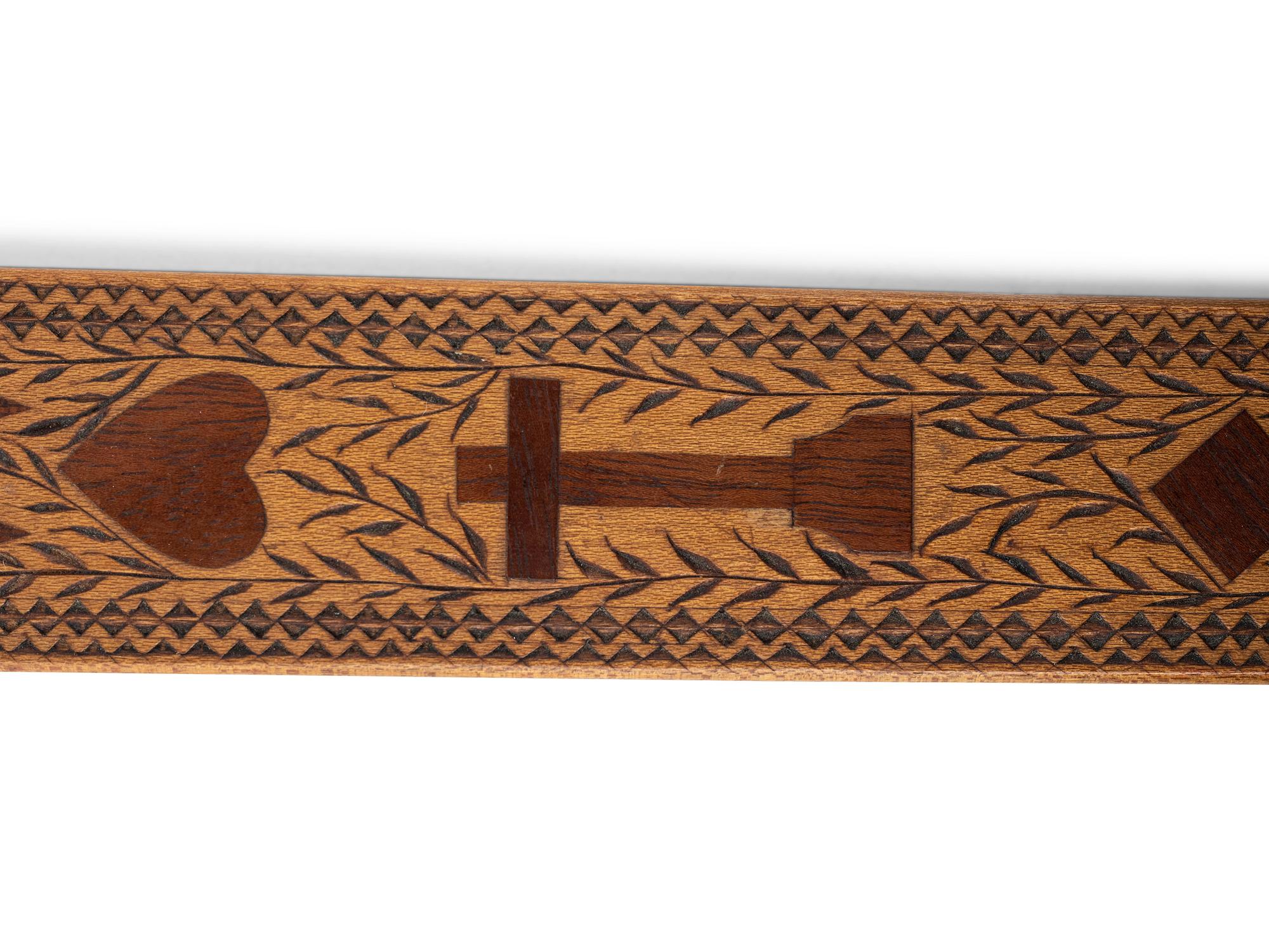 An Inlaid Wood Corset Busk with Initials