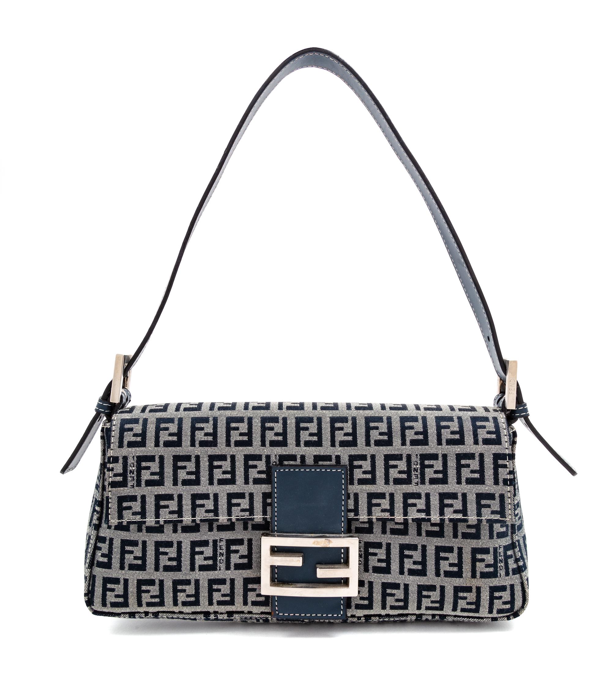 A Fendi Navy Monogram Canvas Zucca Baguette, 5" H x 10.25" W x 1.75" D; Strap drop: 6.5"- 9.5".