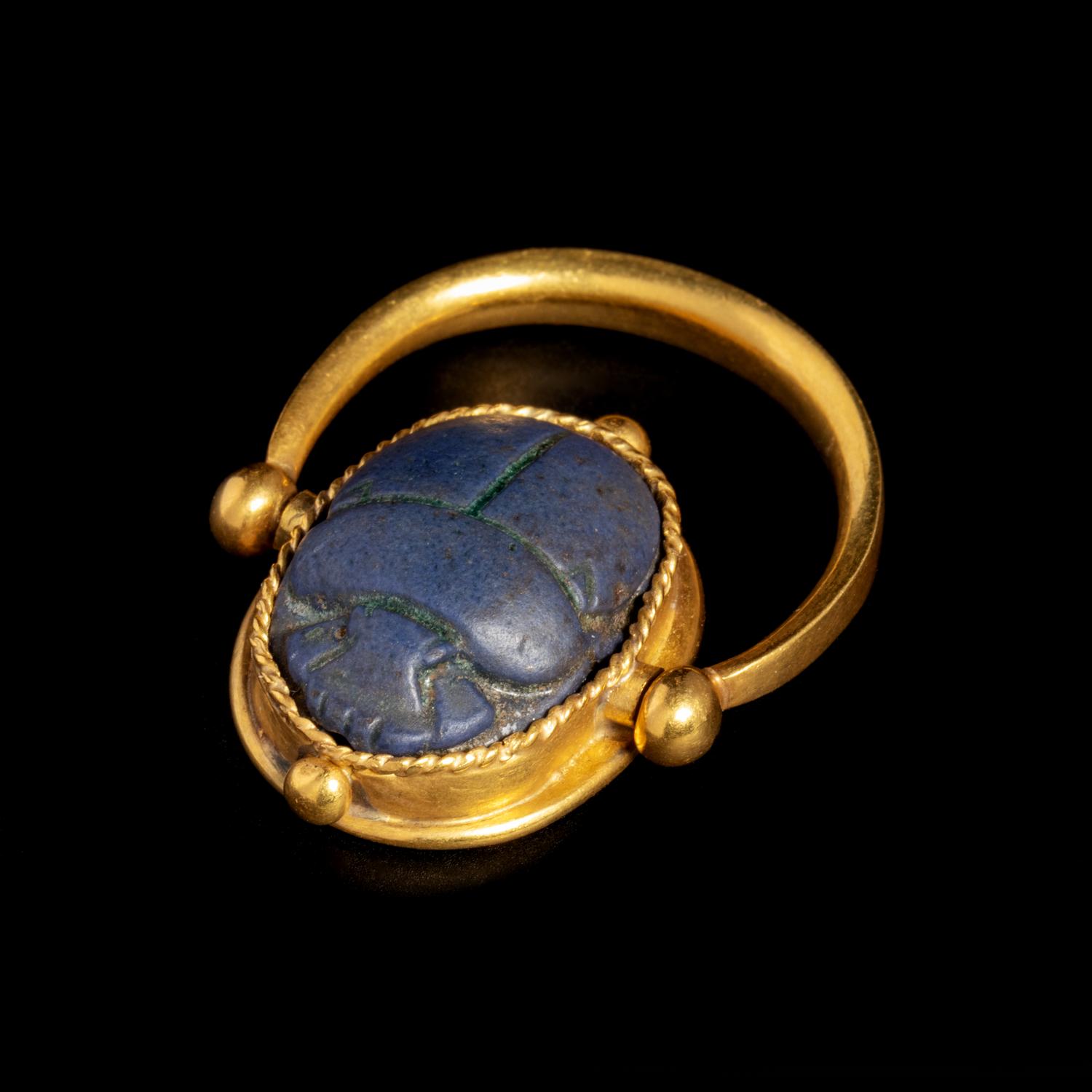 An Egyptian Faience Scarab Swivel Ring
