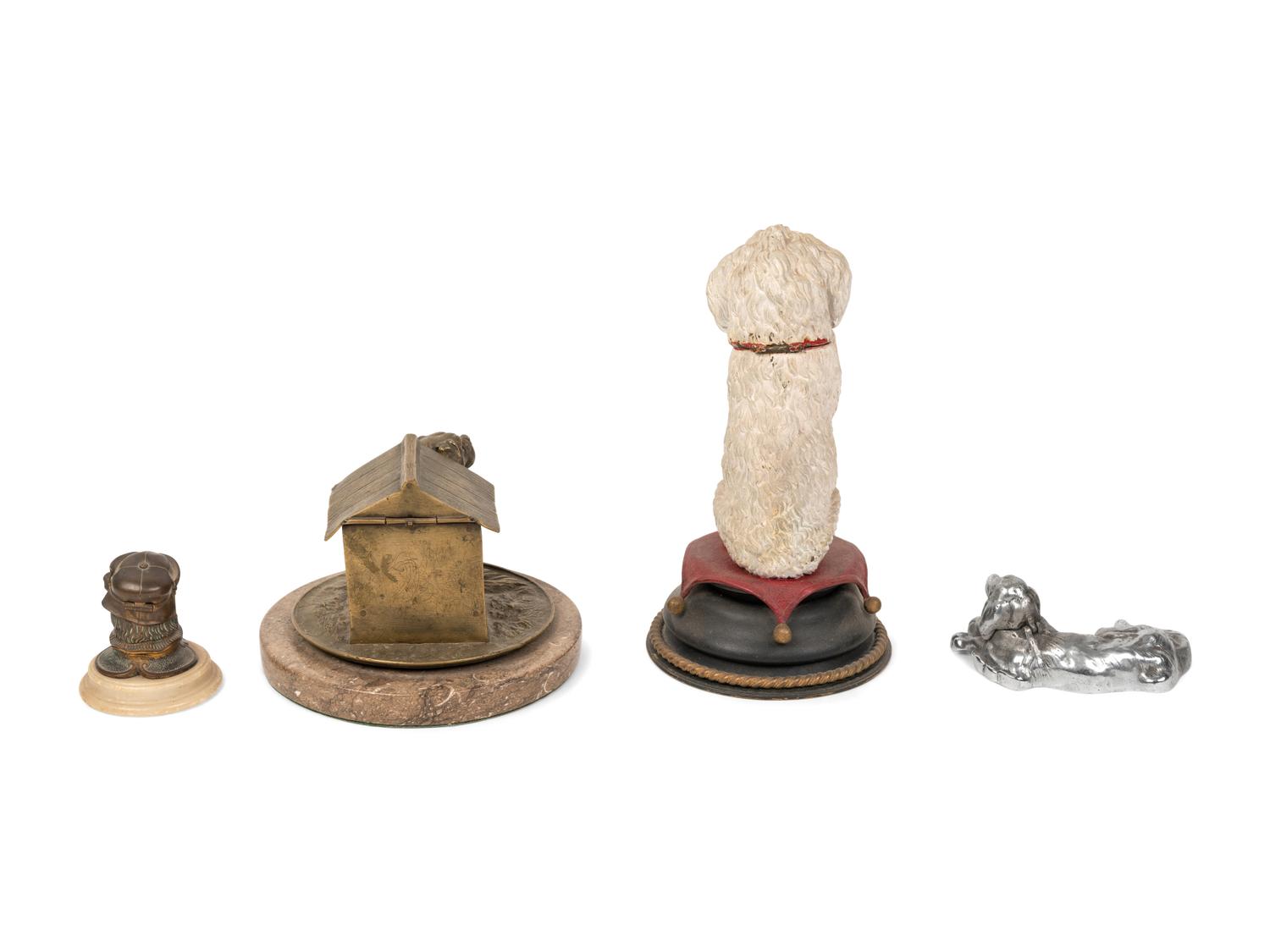 A Collection of Four Dog-Themed Inkwells