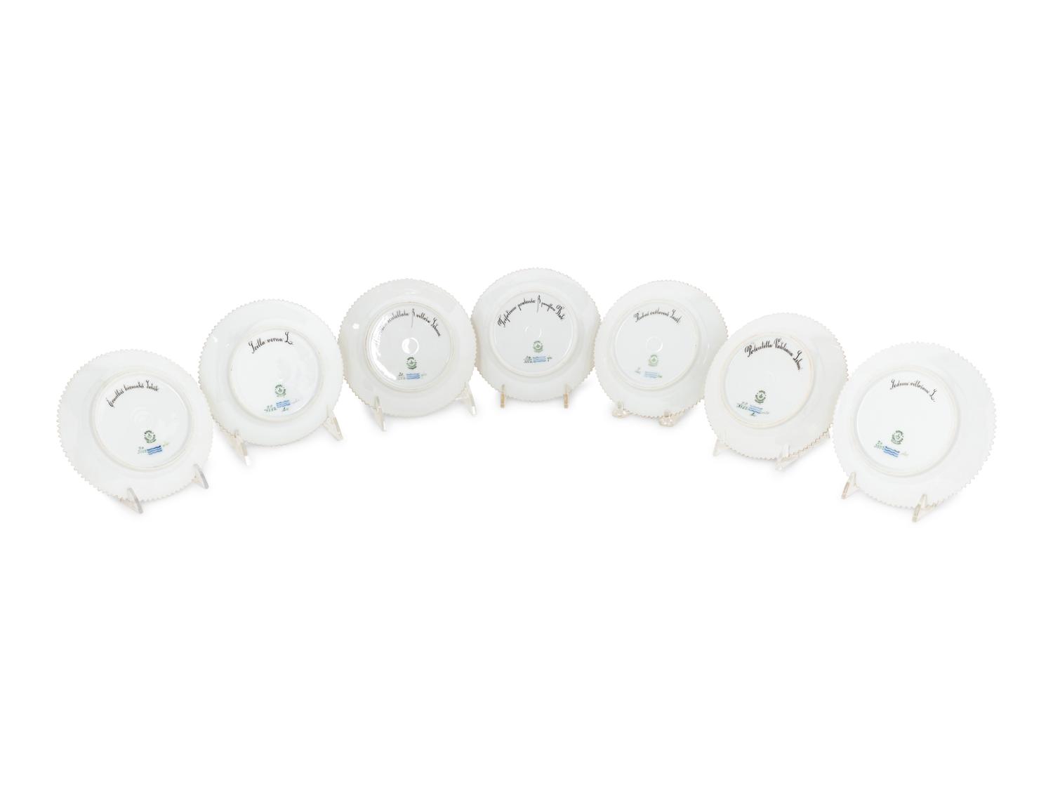 A Set of Fourteen Royal Copenhagen Flora Danica Bread Plates