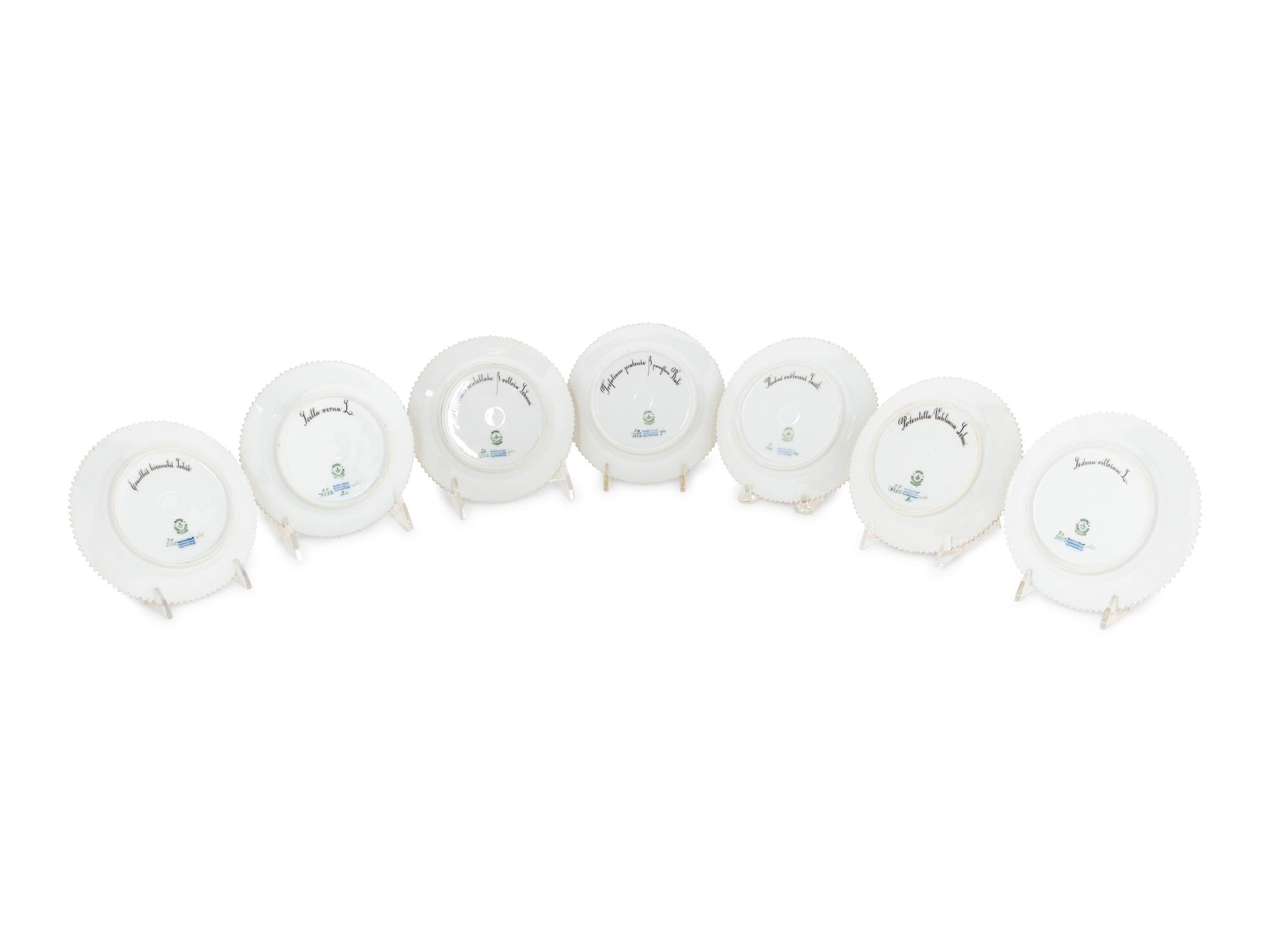 A Set of Fourteen Royal Copenhagen Flora Danica Bread Plates