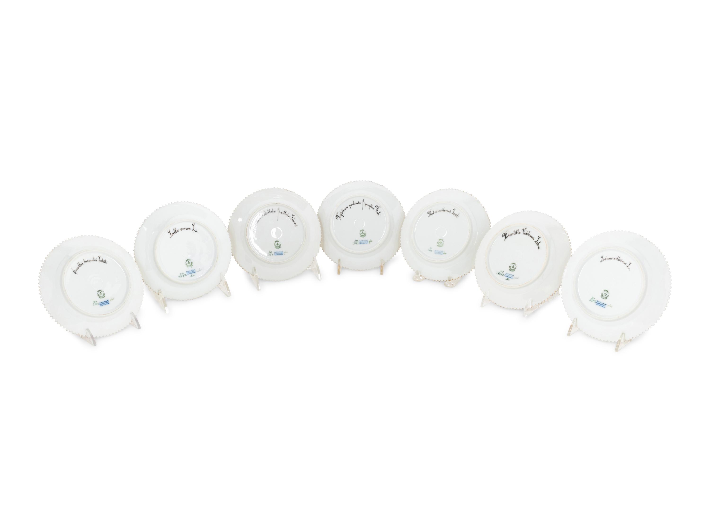 A Set of Fourteen Royal Copenhagen Flora Danica Bread Plates