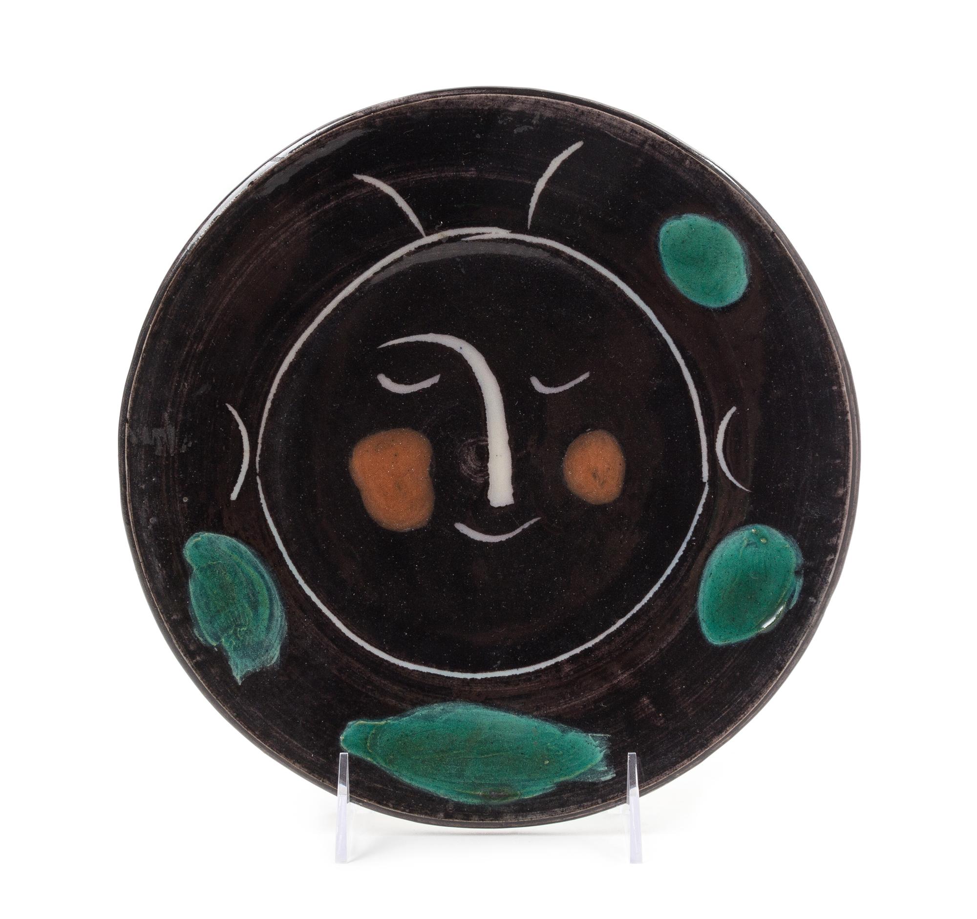 Pablo Picasso, (Spanish, 1881-1973), Black Face Plate, 1948