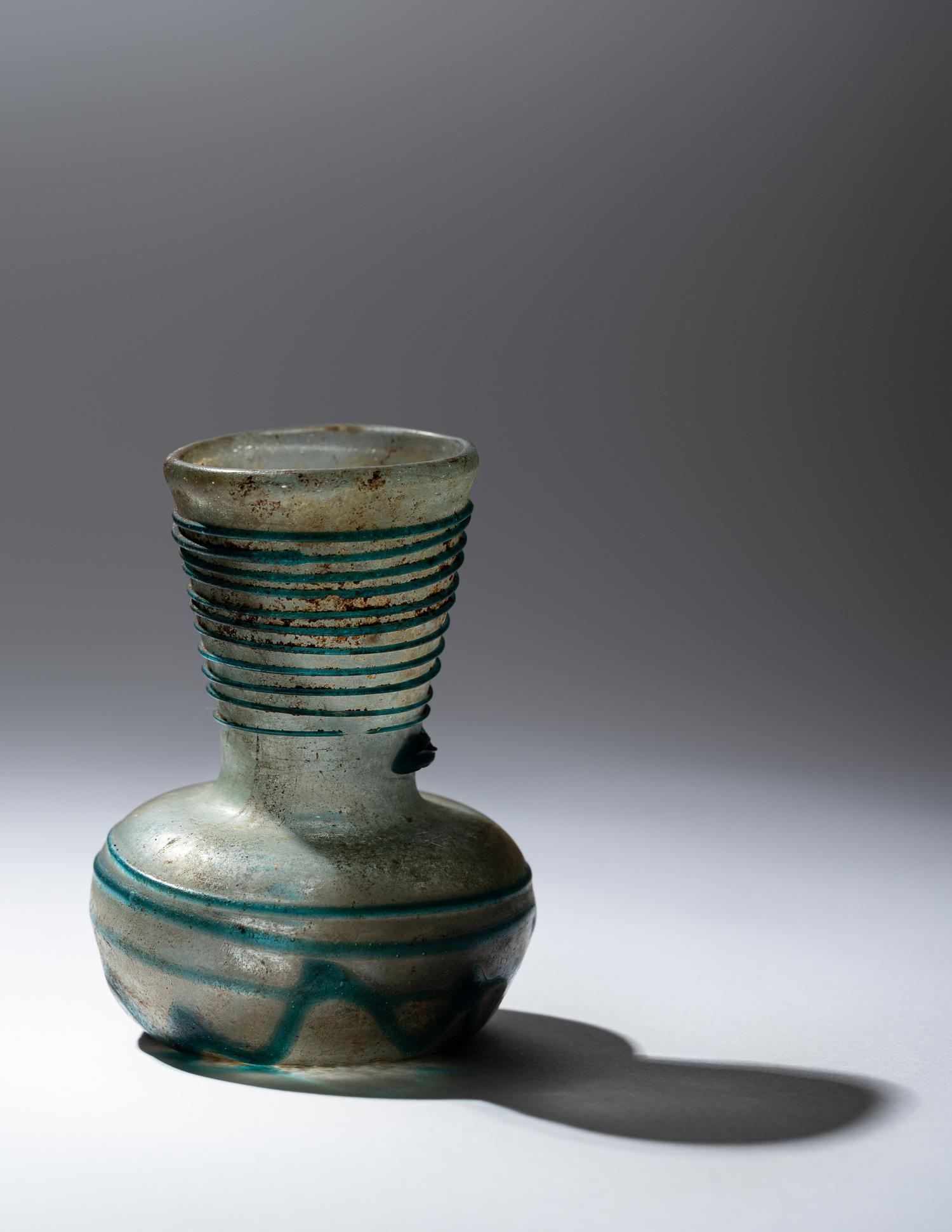 A Roman Pale Blue Glass Bottle