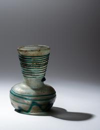 A Roman Pale Blue Glass Bottle