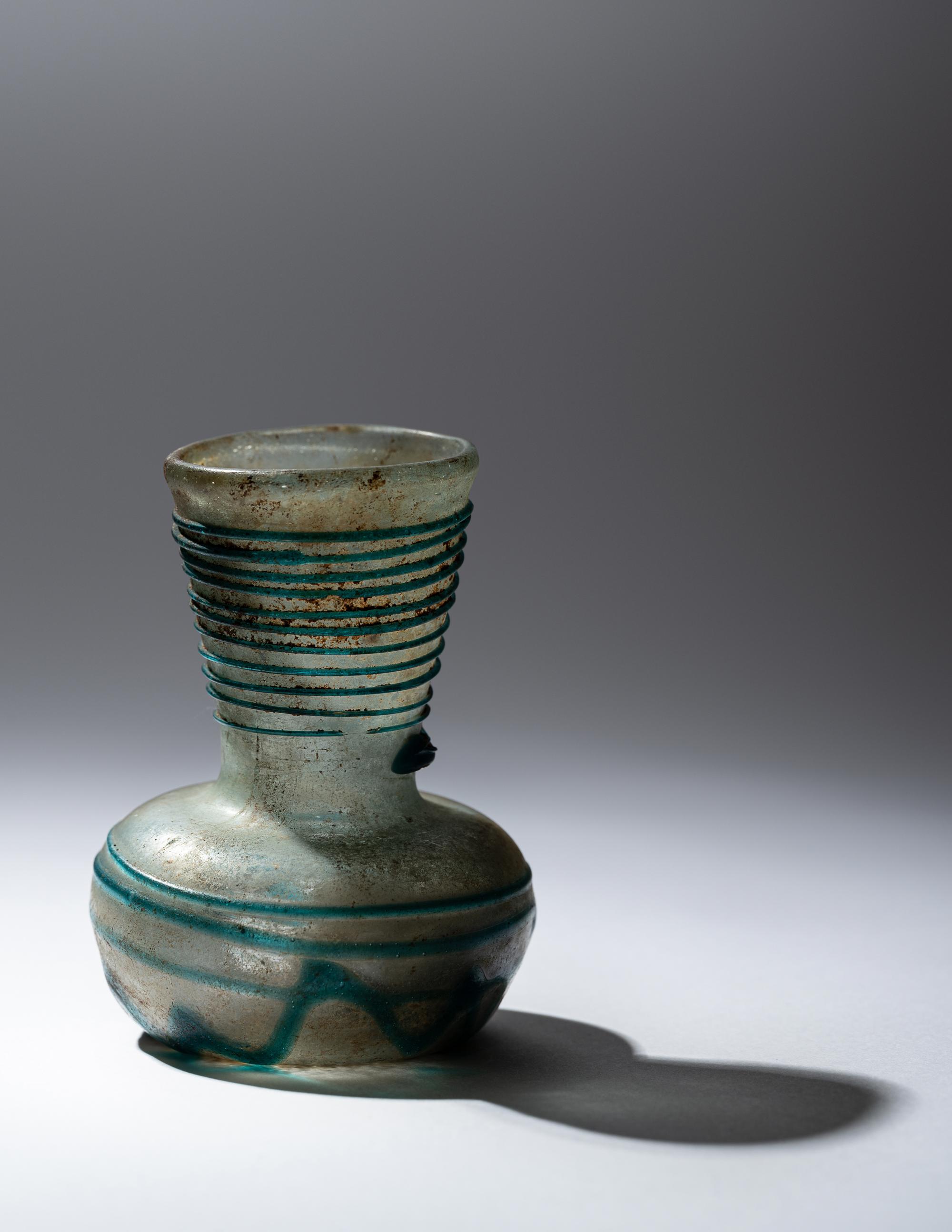 A Roman Pale Blue Glass Bottle