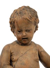 A Flemish Carved Wood Putto