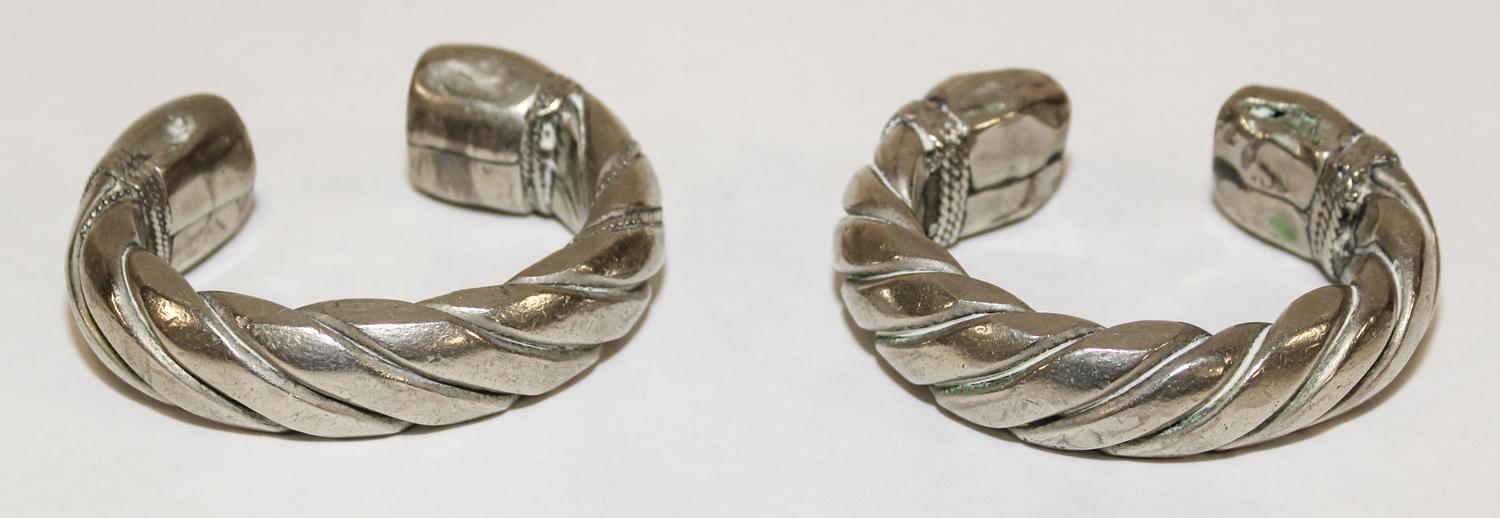 A Pair of Bedouin Silver Bangles Diameter of exterior 2 1/2 inches.