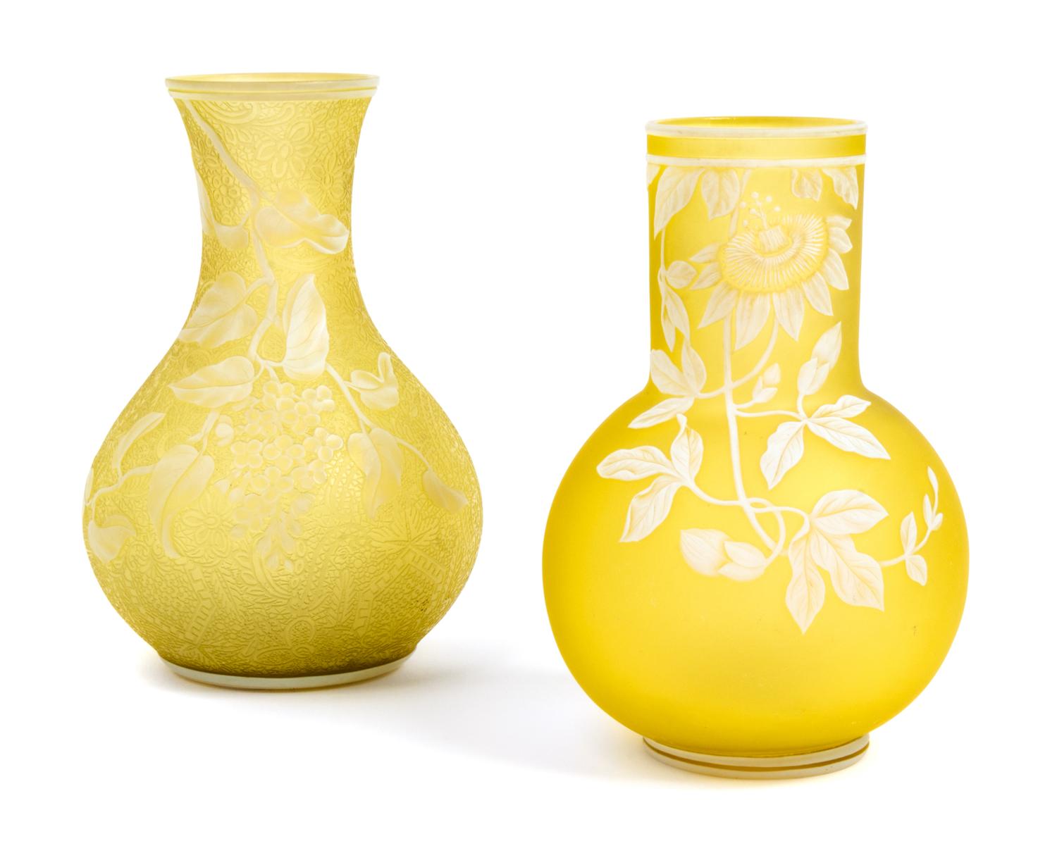 Thomas Webb & Sons, LATE 19TH CENTURY, two cameo glass vases, each of bottle form with foliate decoration, one also with butterfly