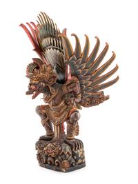An Indian Carved and Polychrome Painted Wood Garuda Figure