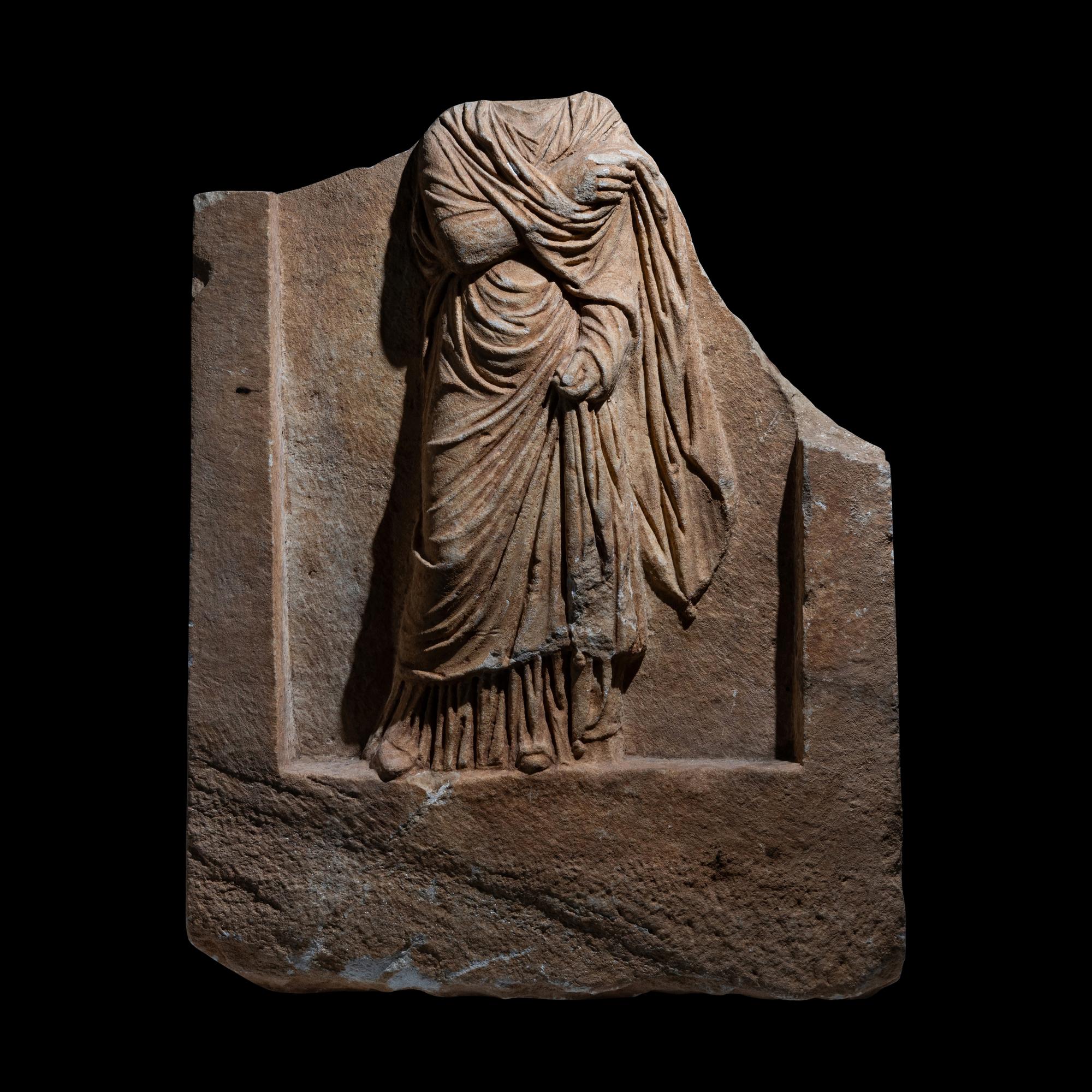 A Roman Marble Funerary Relief Fragment