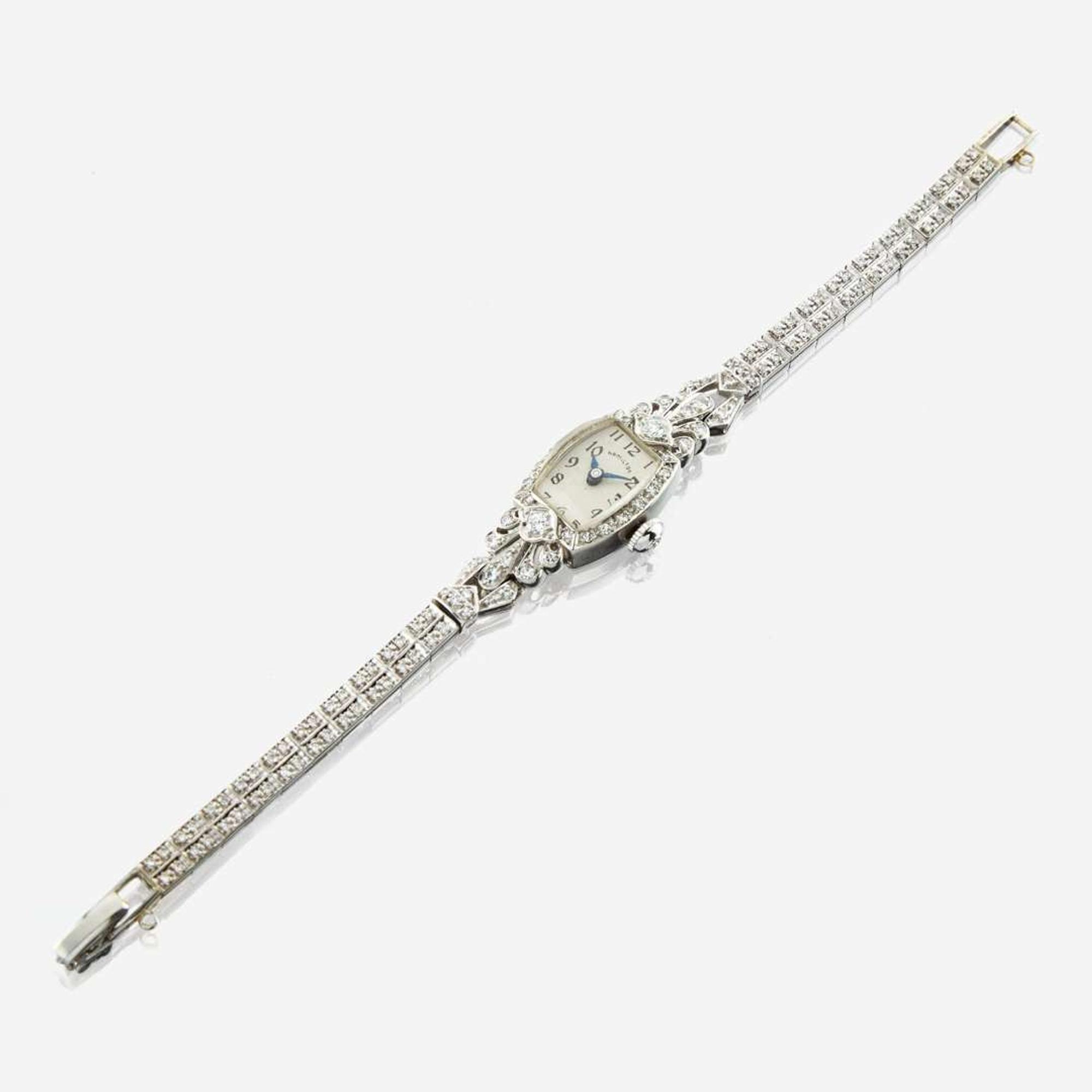 A lady's platinum and white gold diamond bracelet watch, Hamilton