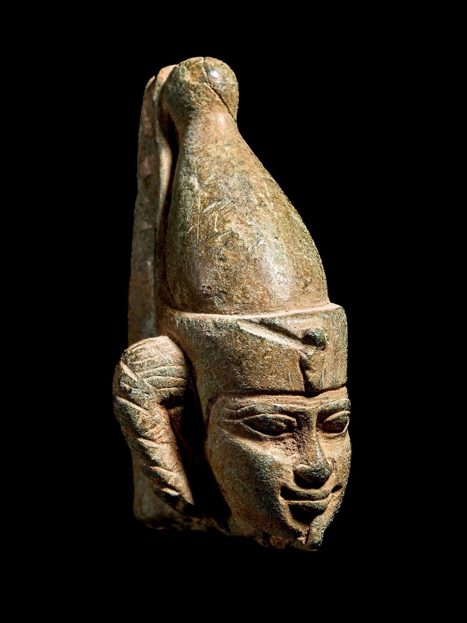 An Egyptian Steatite Head of Horus