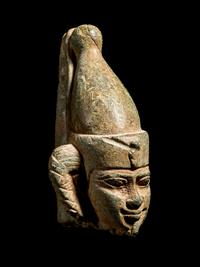 An Egyptian Steatite Head of Horus