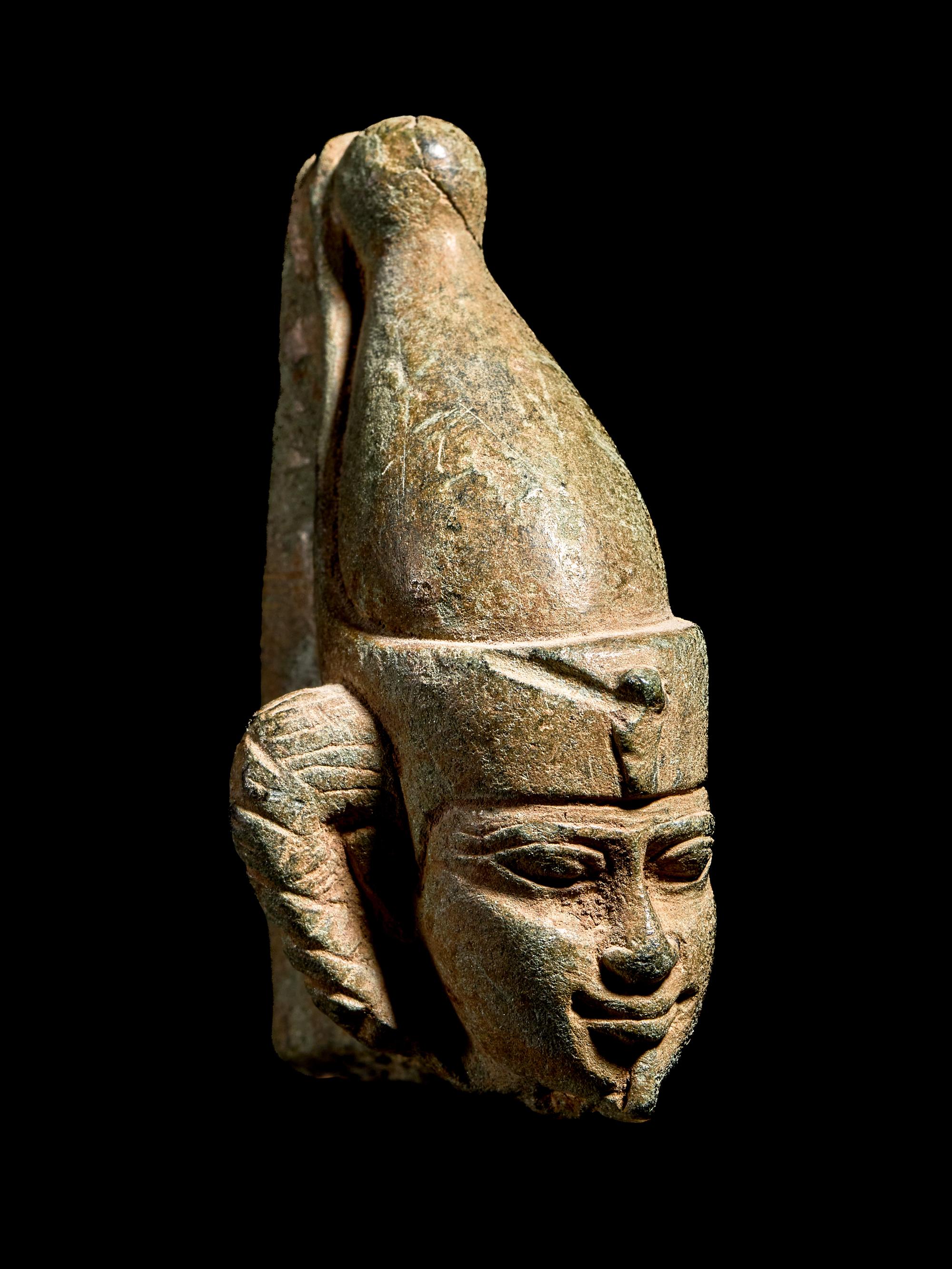 An Egyptian Steatite Head of Horus