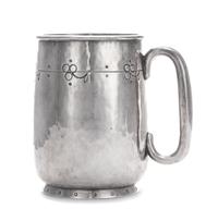 A George V Silver Mug, Liberty & Co., Birmingham, 1914, in the Arts & Crafts taste, with spot-hammered surfaces and stylized chased che