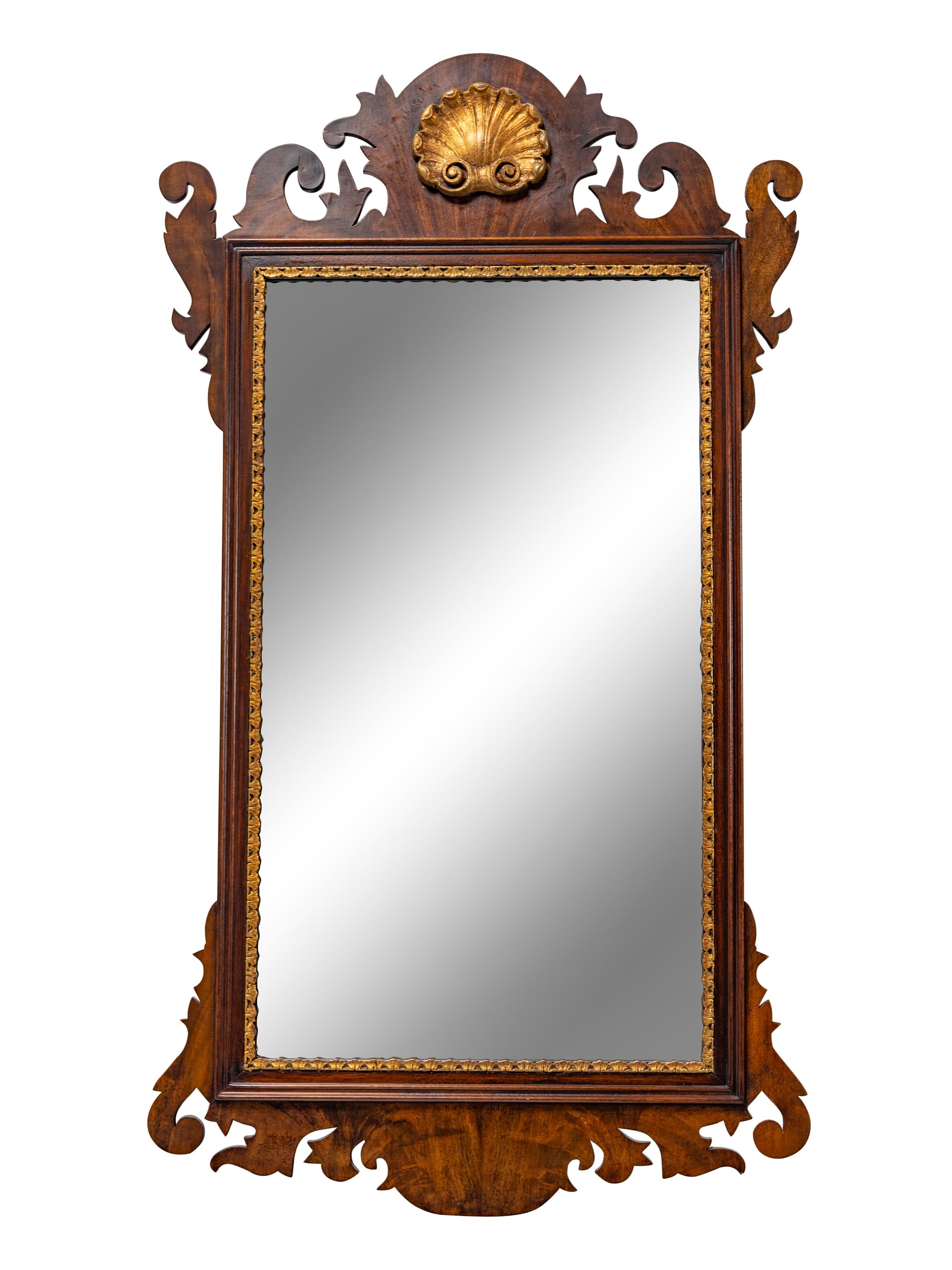 A George III Parcel Gilt Mahogany Mirror