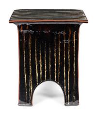 A Brown-Glazed Ceramic Side Table