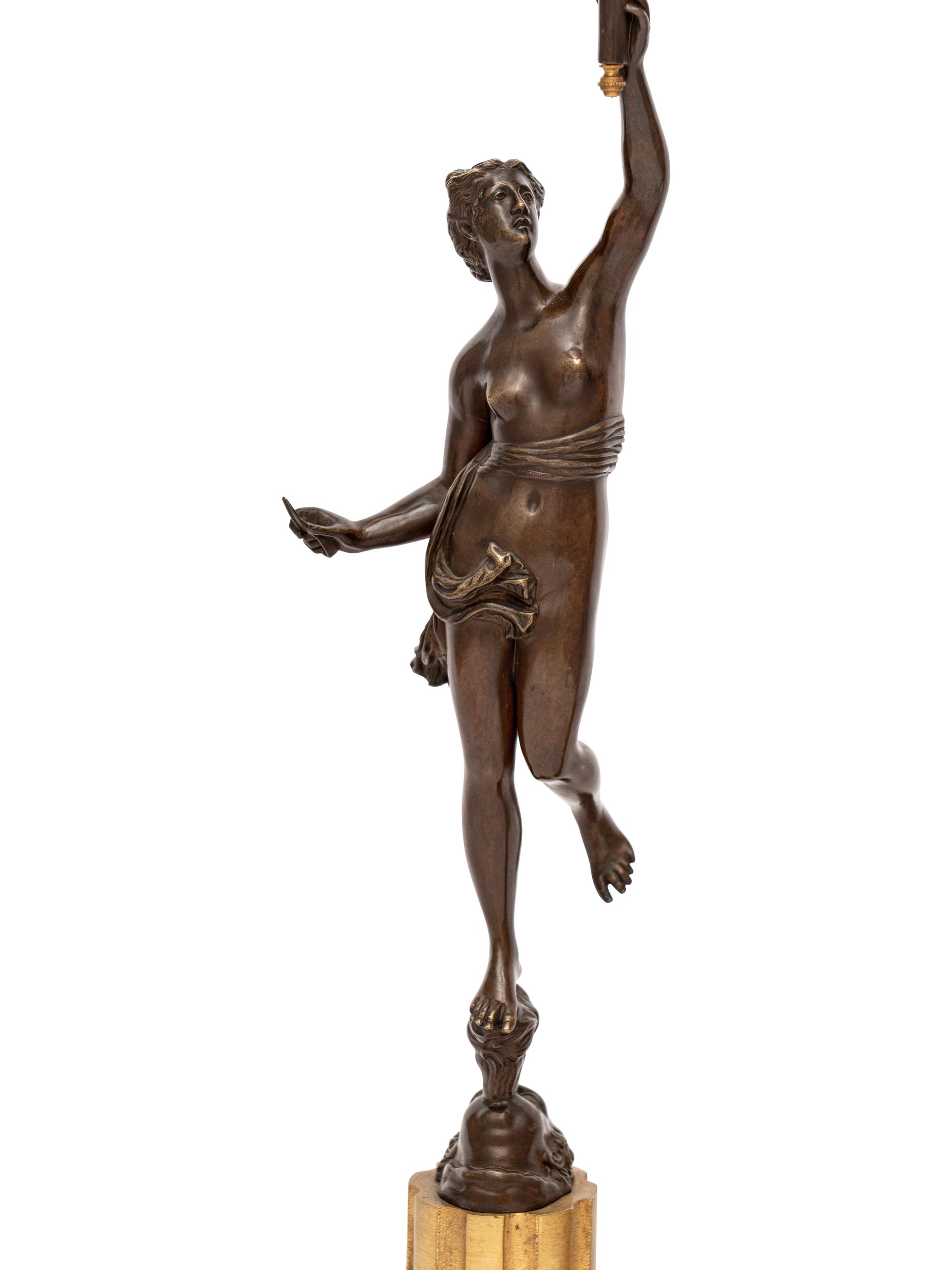 A Pair of Gilt and Patinated Bronze Figural Four-Light Candelabra