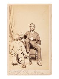[AFRICAN AMERICANA - EARLY PHOTOGRAPHY]. CDV of Captain W.H. Lane & his African American assistant. Norfolk, VA: Holmes' Gallery.
