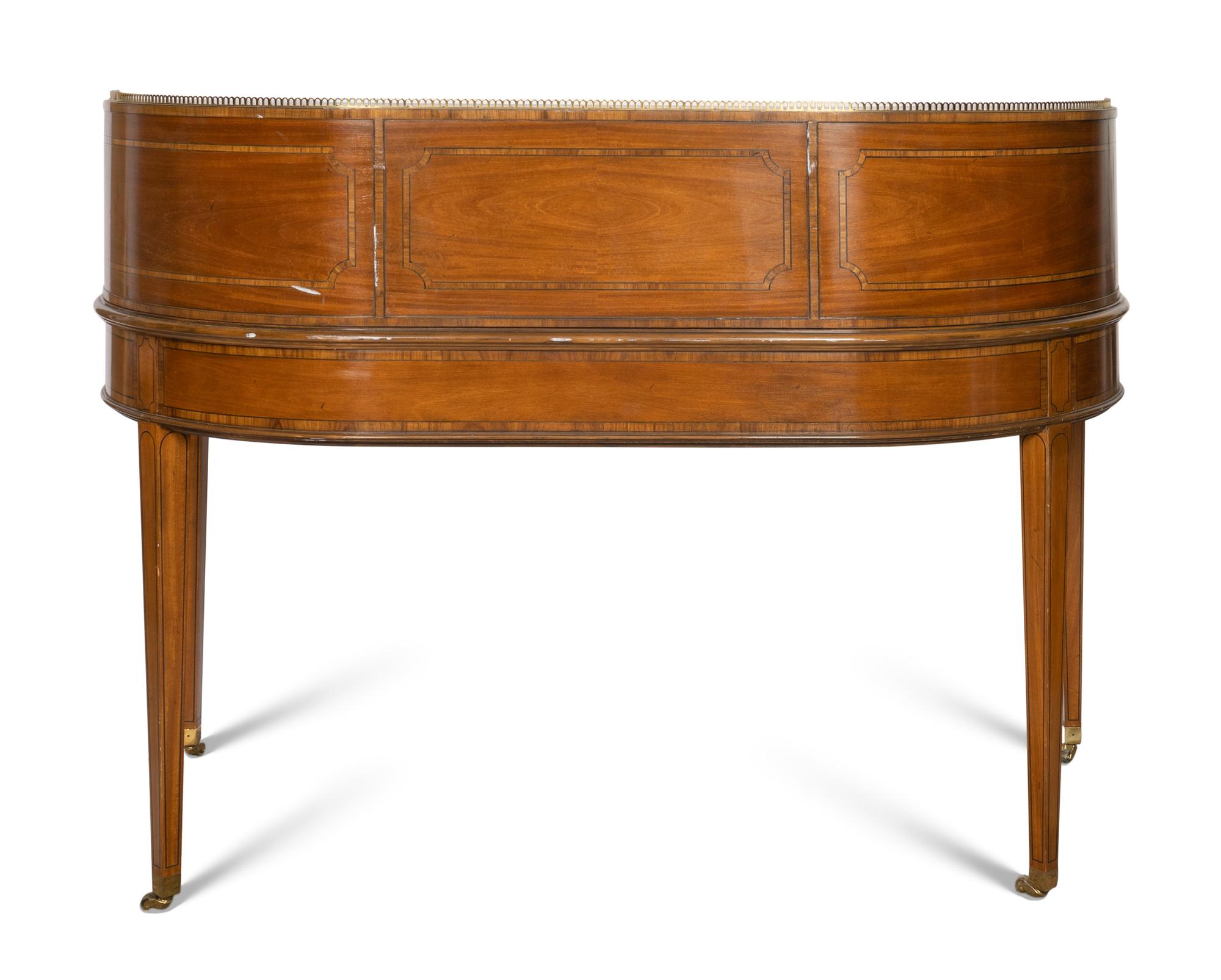A Baker Satinwood and Rosewood 1765 Carlton House Desk