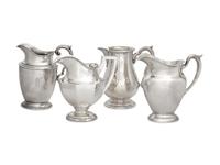 A Group of Four American Silver Water Pitchers