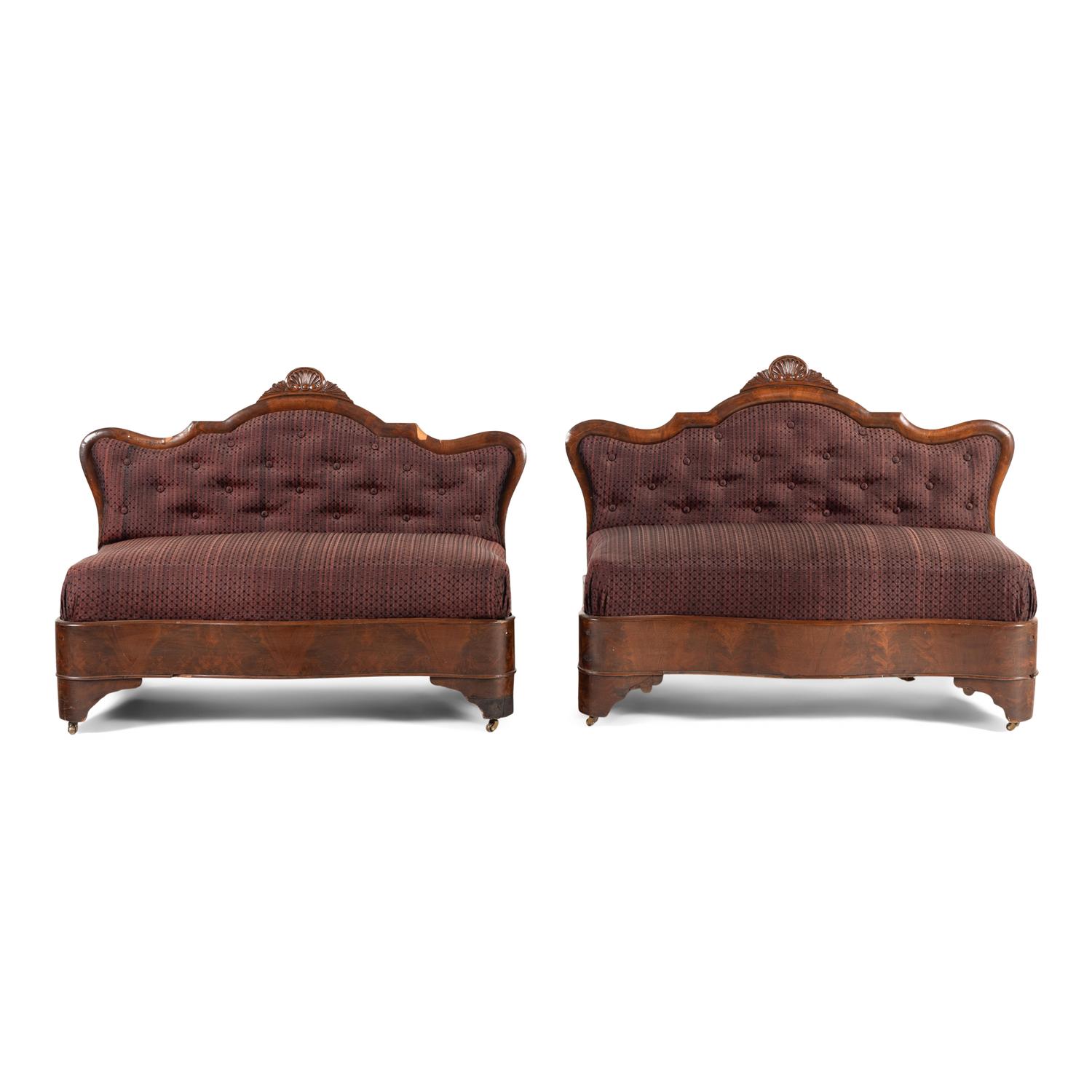 A Pair of Classical Veneered Mahogany and Upholstered Settees