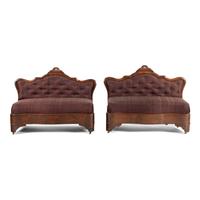 A Pair of Classical Veneered Mahogany and Upholstered Settees