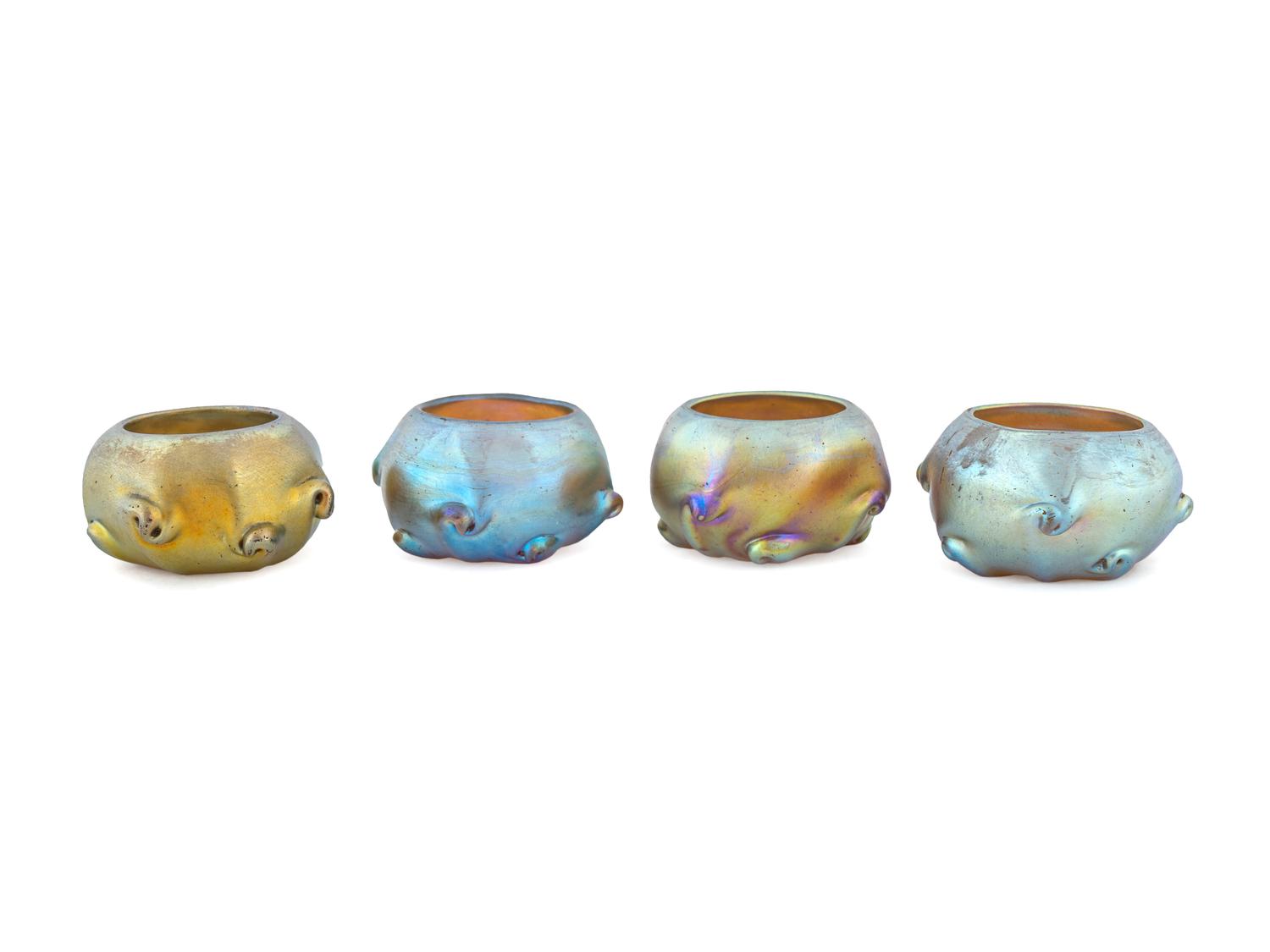 Four Tiffany Studios Favrile Glass Dimpled Salts — EARLY 20TH CENTURY