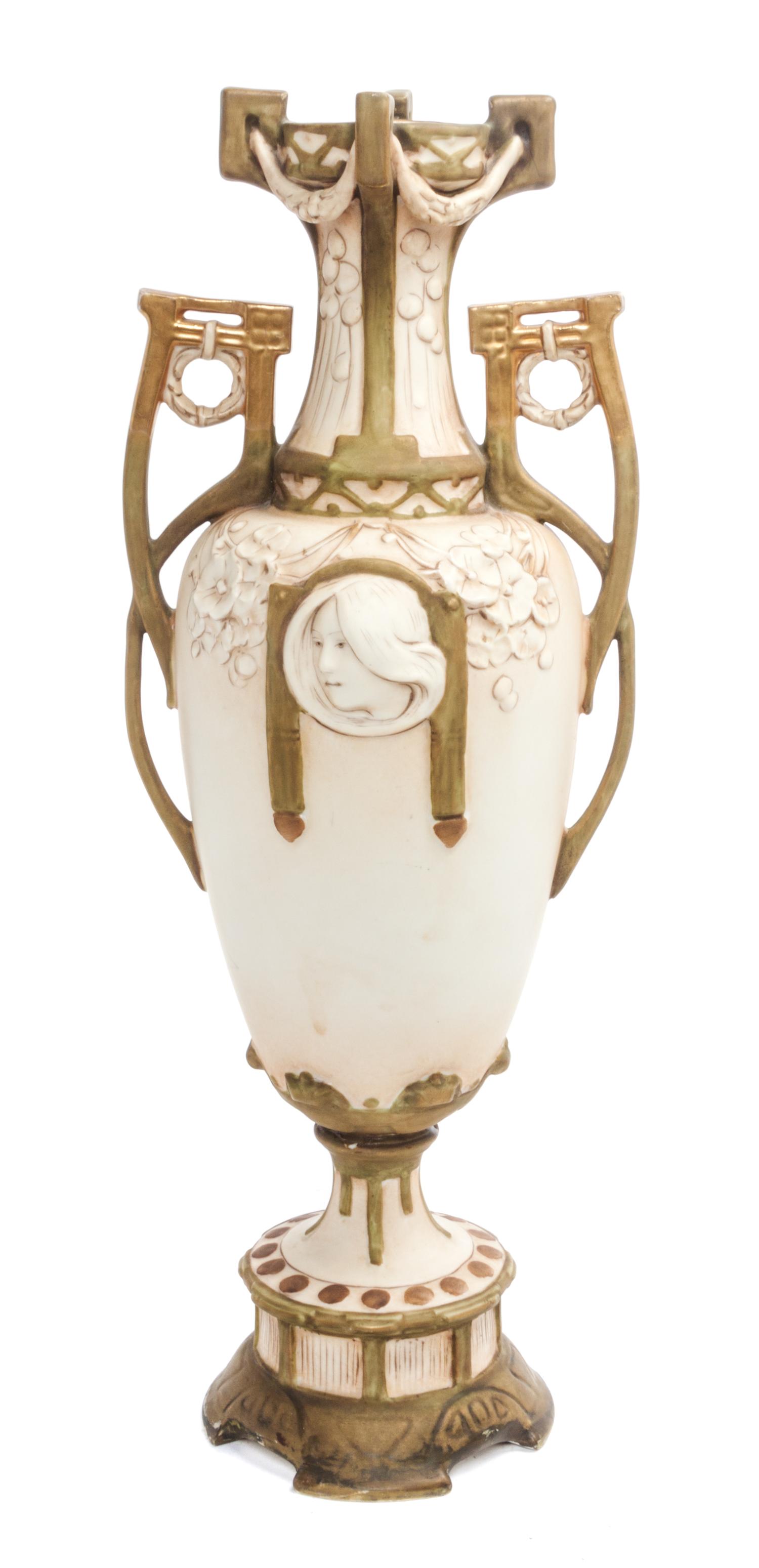 A Royal Dux Porcelain Vase Height 15 3/4 inches.