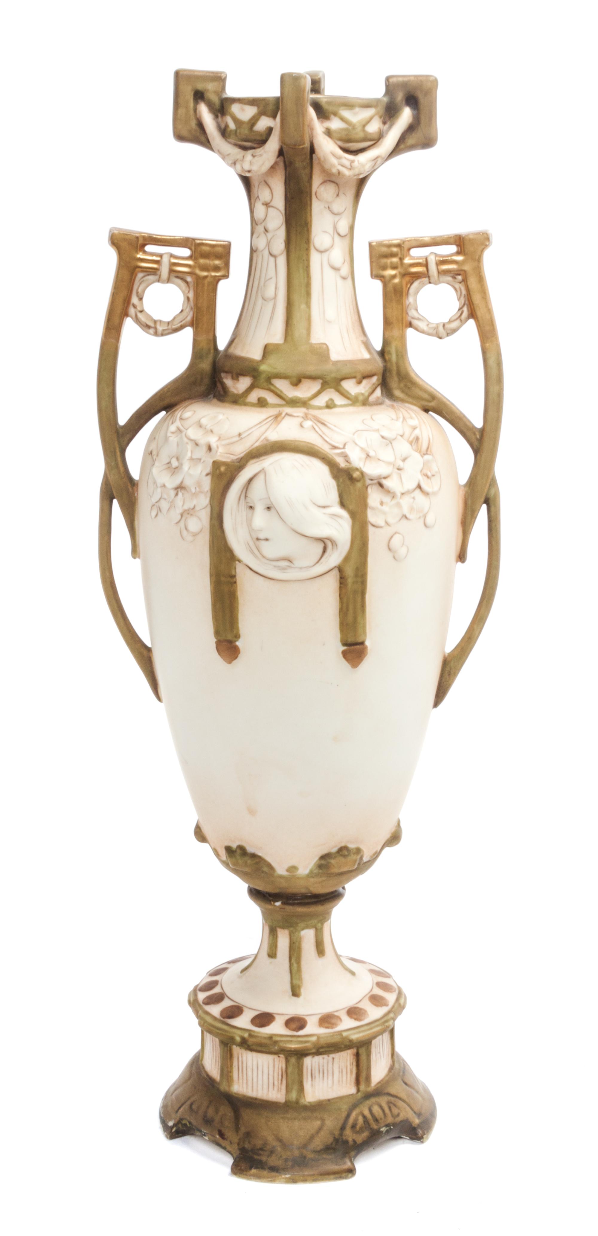 A Royal Dux Porcelain Vase Height 15 3/4 inches.