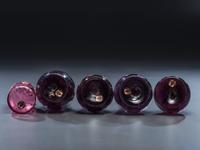 Five Enameled Glass Barber Bottles