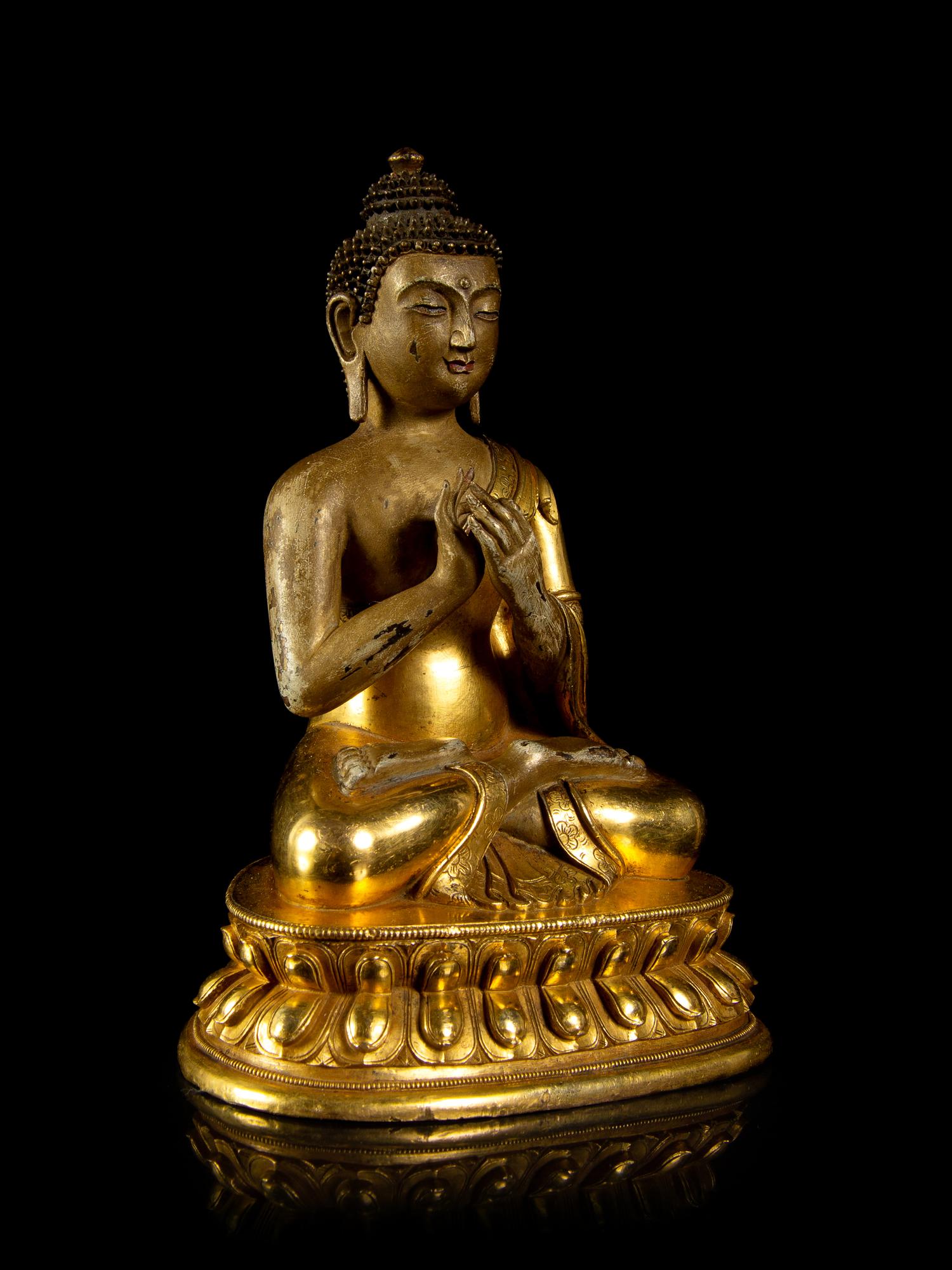 A Sino-Tibetan Gilt Bronze Figure of Buddha