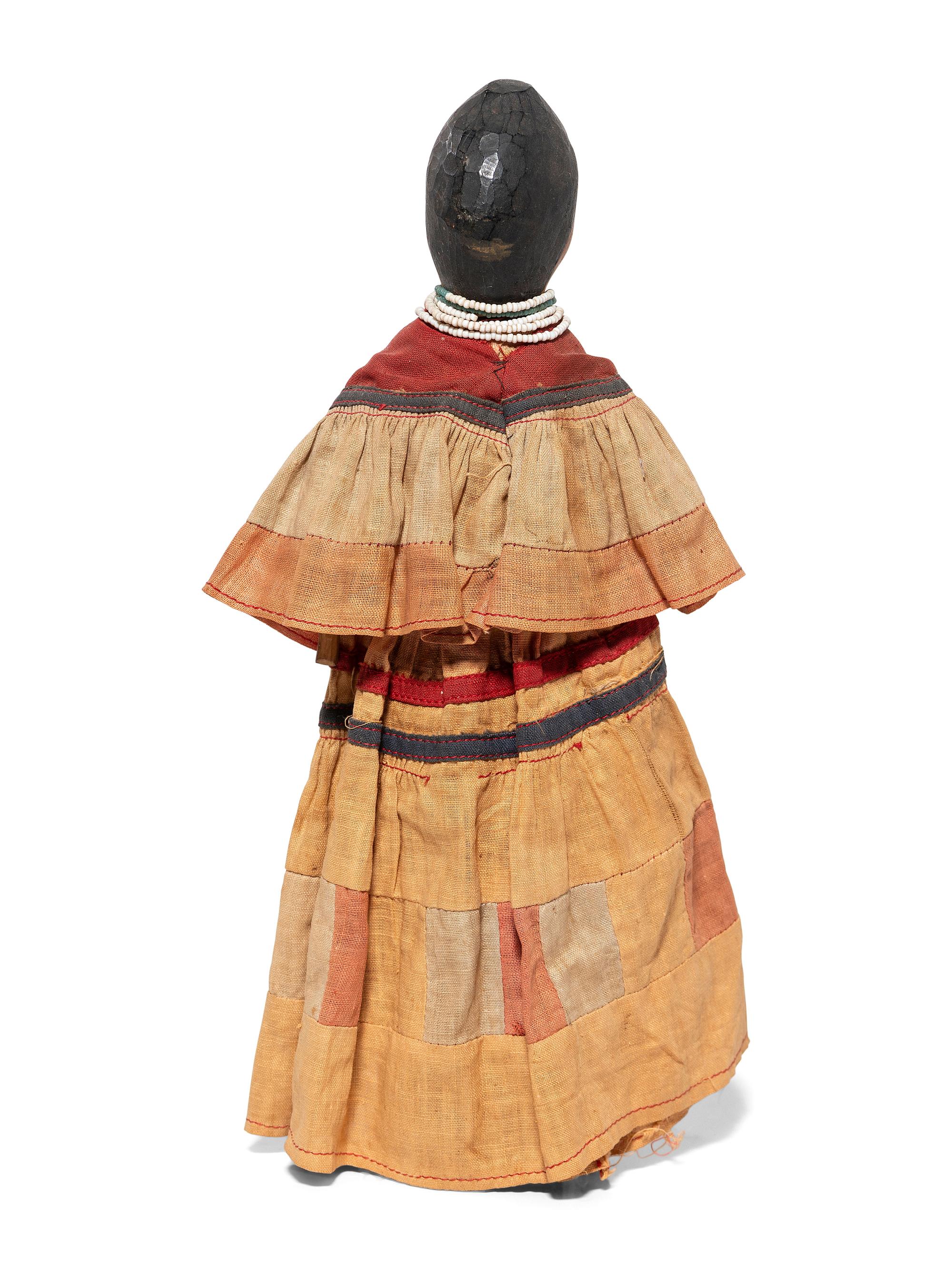 Seminole Carved and Painted Wood Doll, with Patchwork Dress