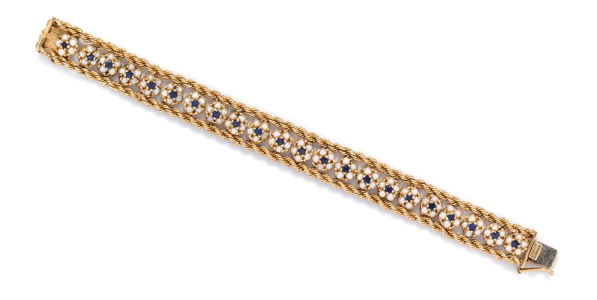 A 14 Karat Yellow Gold, Cultured Pearl and Sapphire Bracelet, 19.50 dwts.