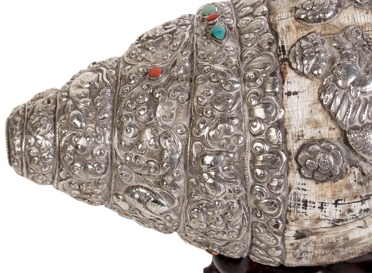 A Tibetan Silver Mounted Shell Horn