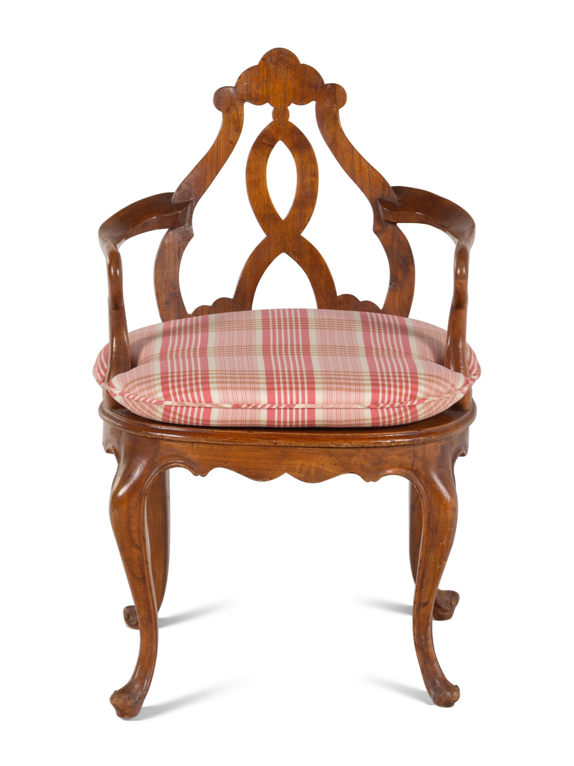 An English Caned Walnut Armchair
