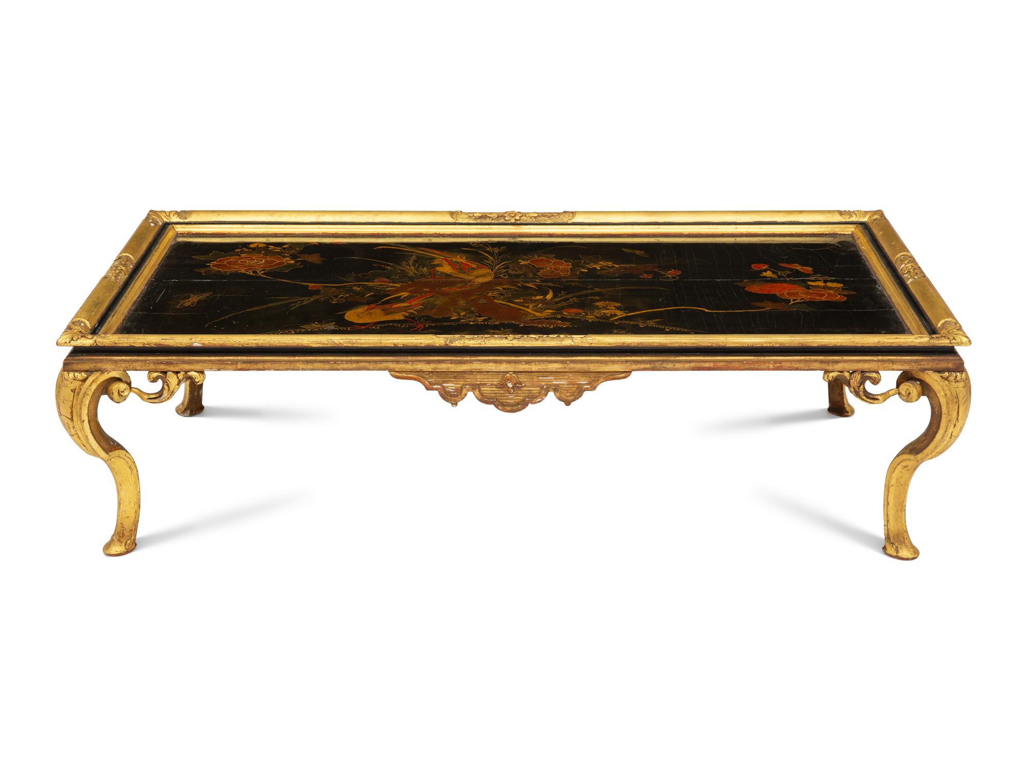 A Continental Giltwood and Chinese Lacquer Low Table