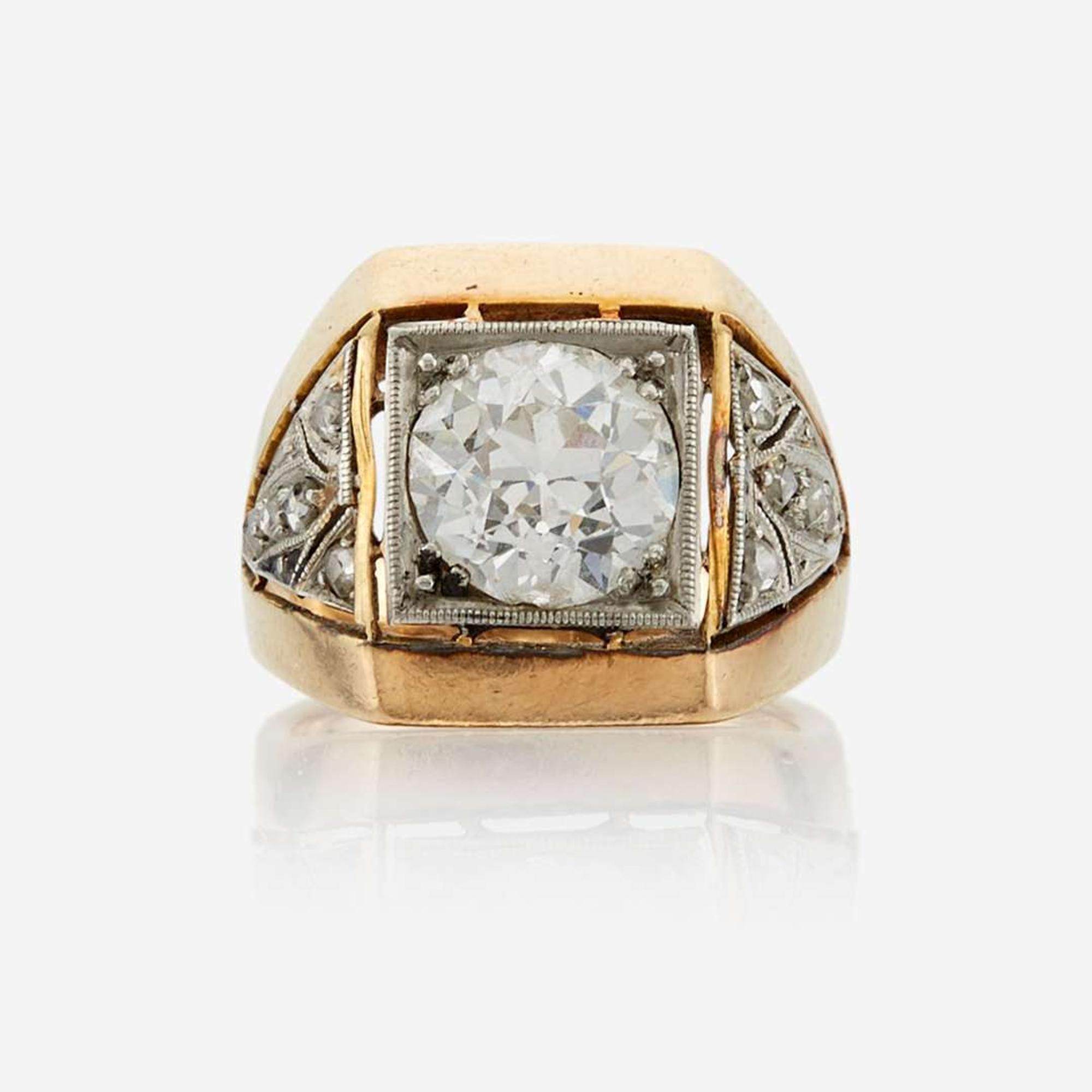 A diamond, gold, and platinum ring